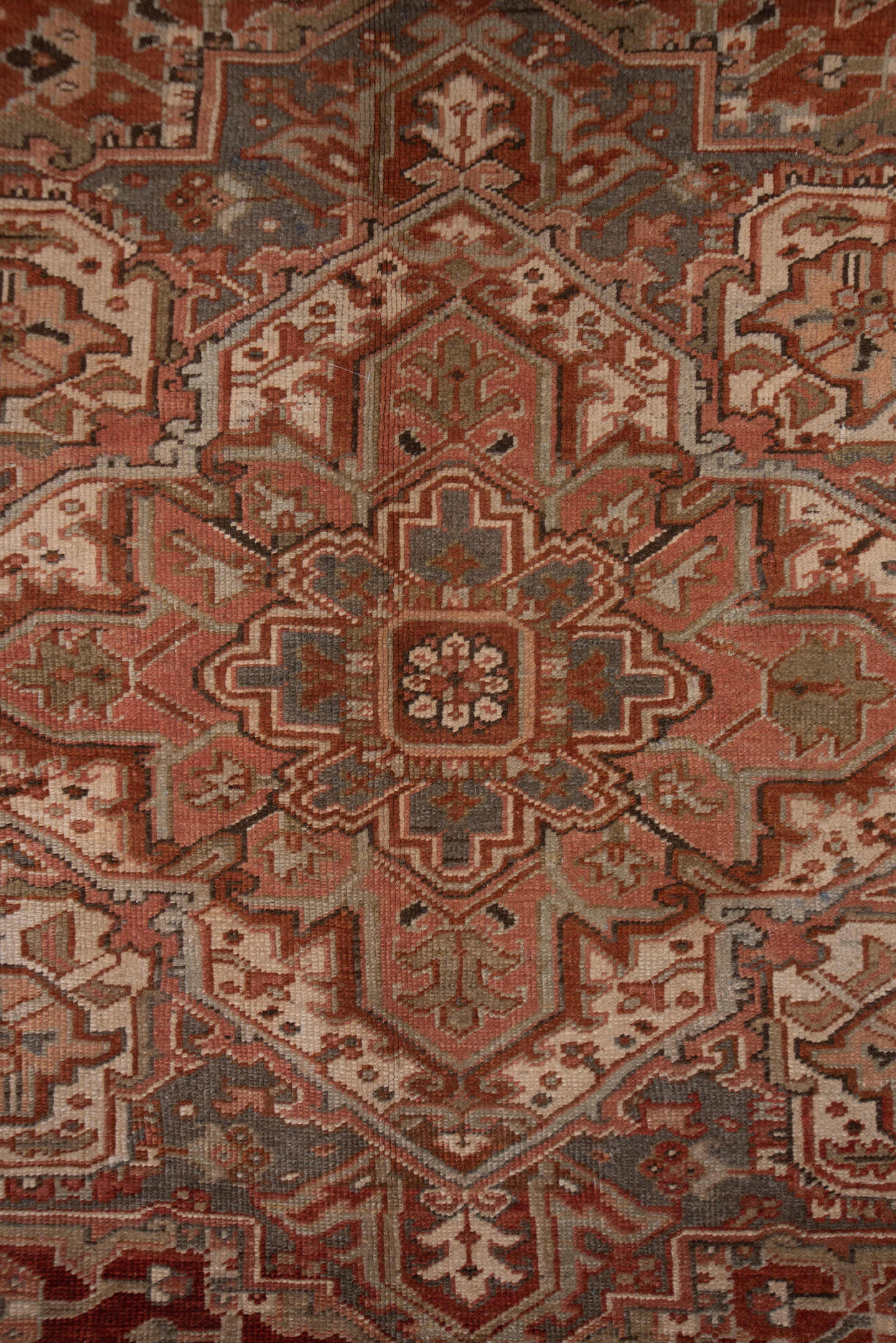 9' x 12' one-of-a-kind handmade vintage Heriz large size rug. Color palette: rust, terracotta, ivory, slate, taupe, brown