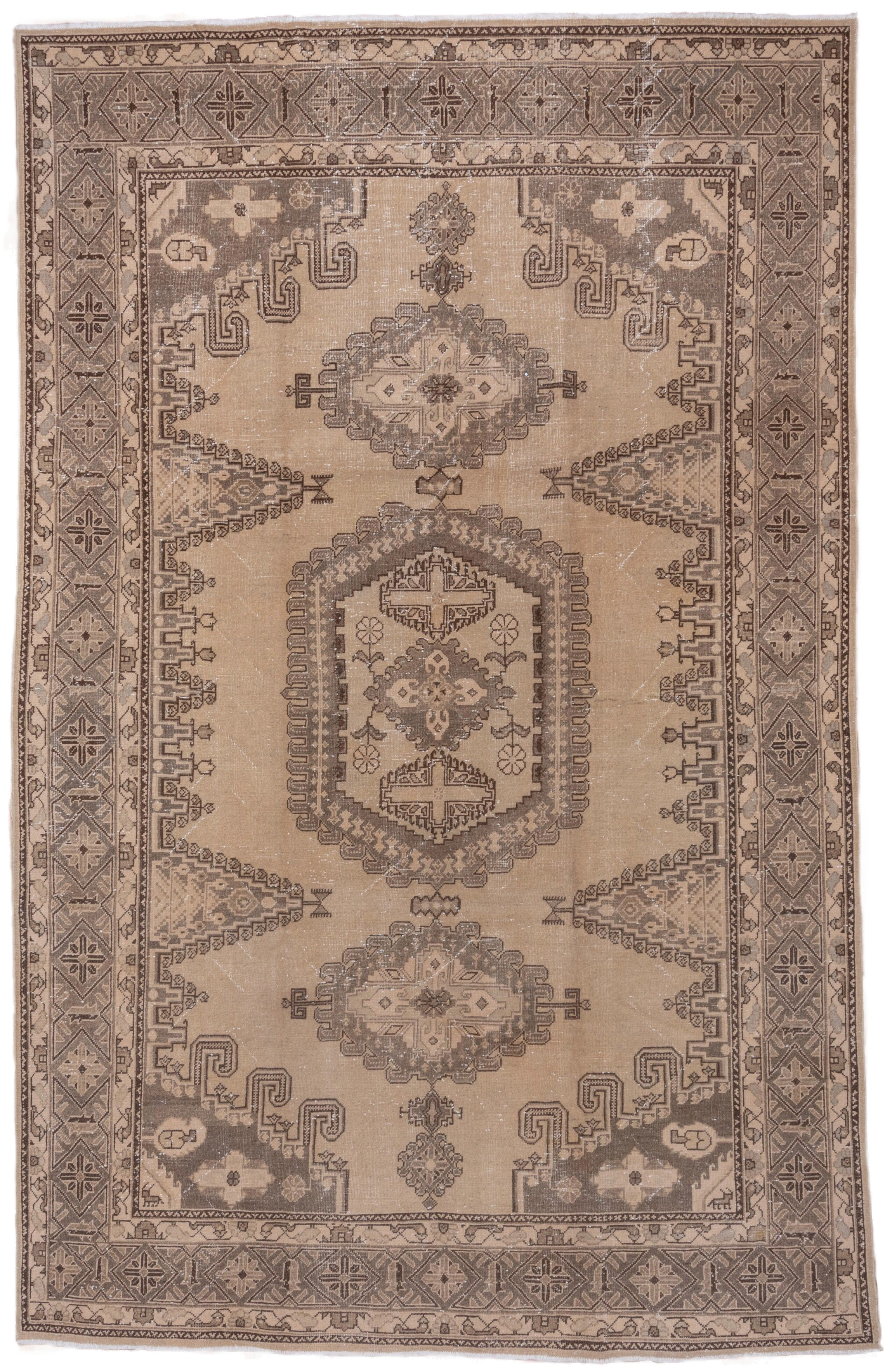 7' x 12' one-of-a-kind handmade antique Veece large size rug. Color palette: taupe, beige, brown, ivory, camel, charcoal