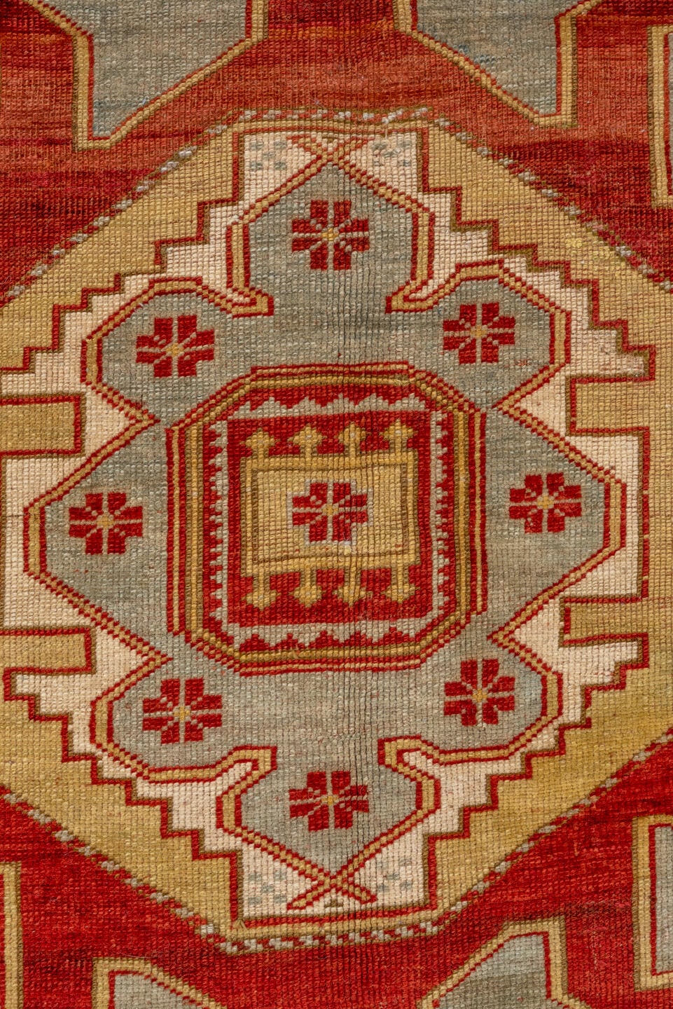 4' x 6' one-of-a-kind handmade antique Caucasian rug. Color palette: ivory, rust, crimson, camel, gold, taupe, terracotta