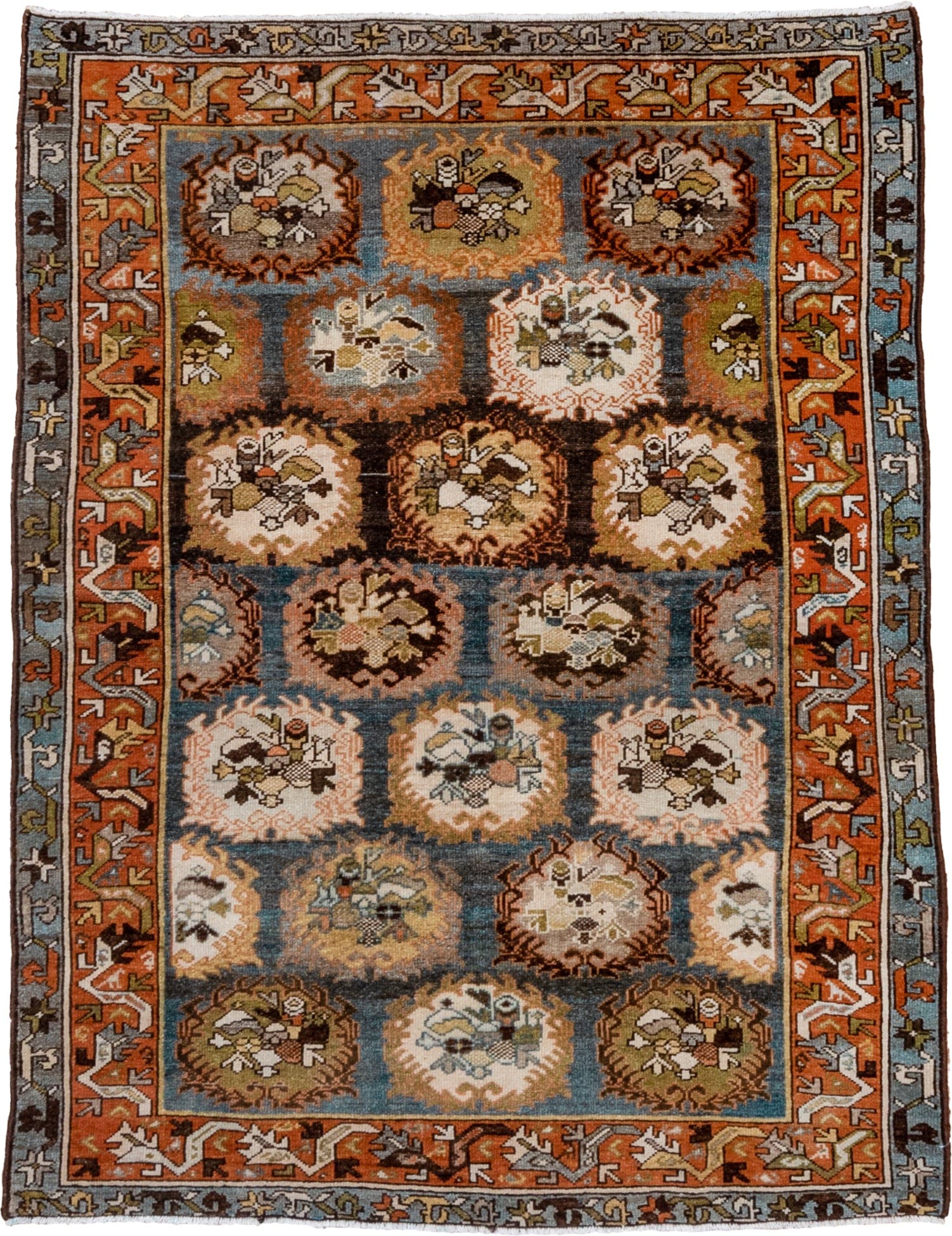4' x 6' one-of-a-kind handmade antique Baktiary rug. Color palette: sky blue, rust, ivory, brown, camel, slate, taupe, olive