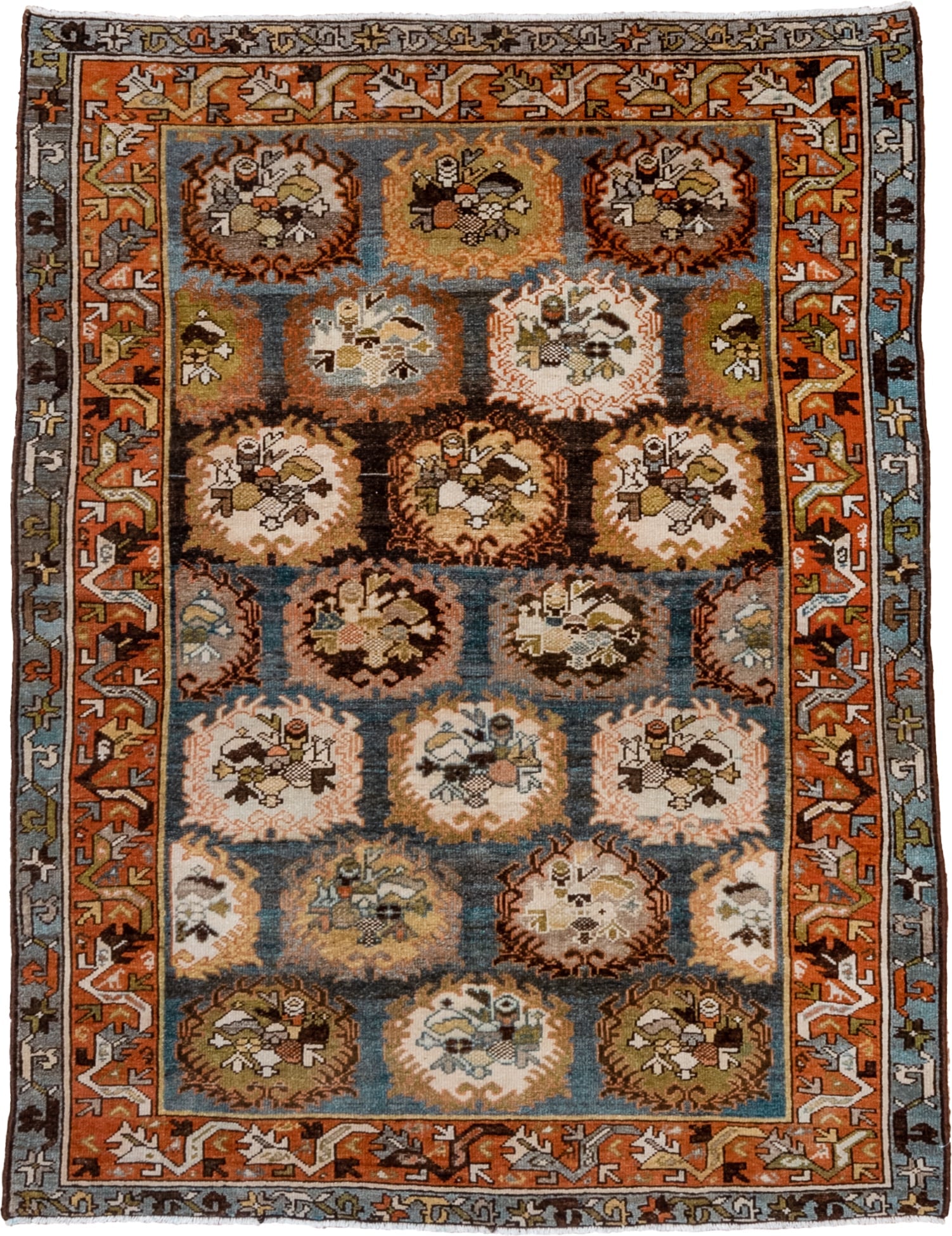 4' x 6' one-of-a-kind handmade antique Baktiary rug. Color palette: sky blue, rust, ivory, brown, camel, slate, taupe, olive
