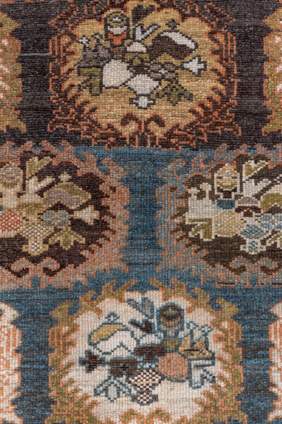 4' x 6' one-of-a-kind handmade antique Baktiary rug. Color palette: sky blue, rust, ivory, brown, camel, slate, taupe, olive