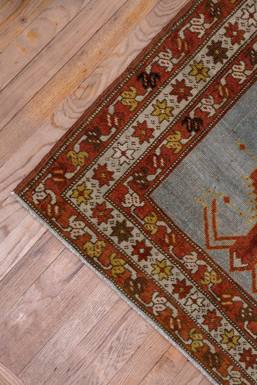 3' x 14' one-of-a-kind handmade antique Heriz runner rug. Color palette: rust, light blue, ivory, gold, brown, charcoal