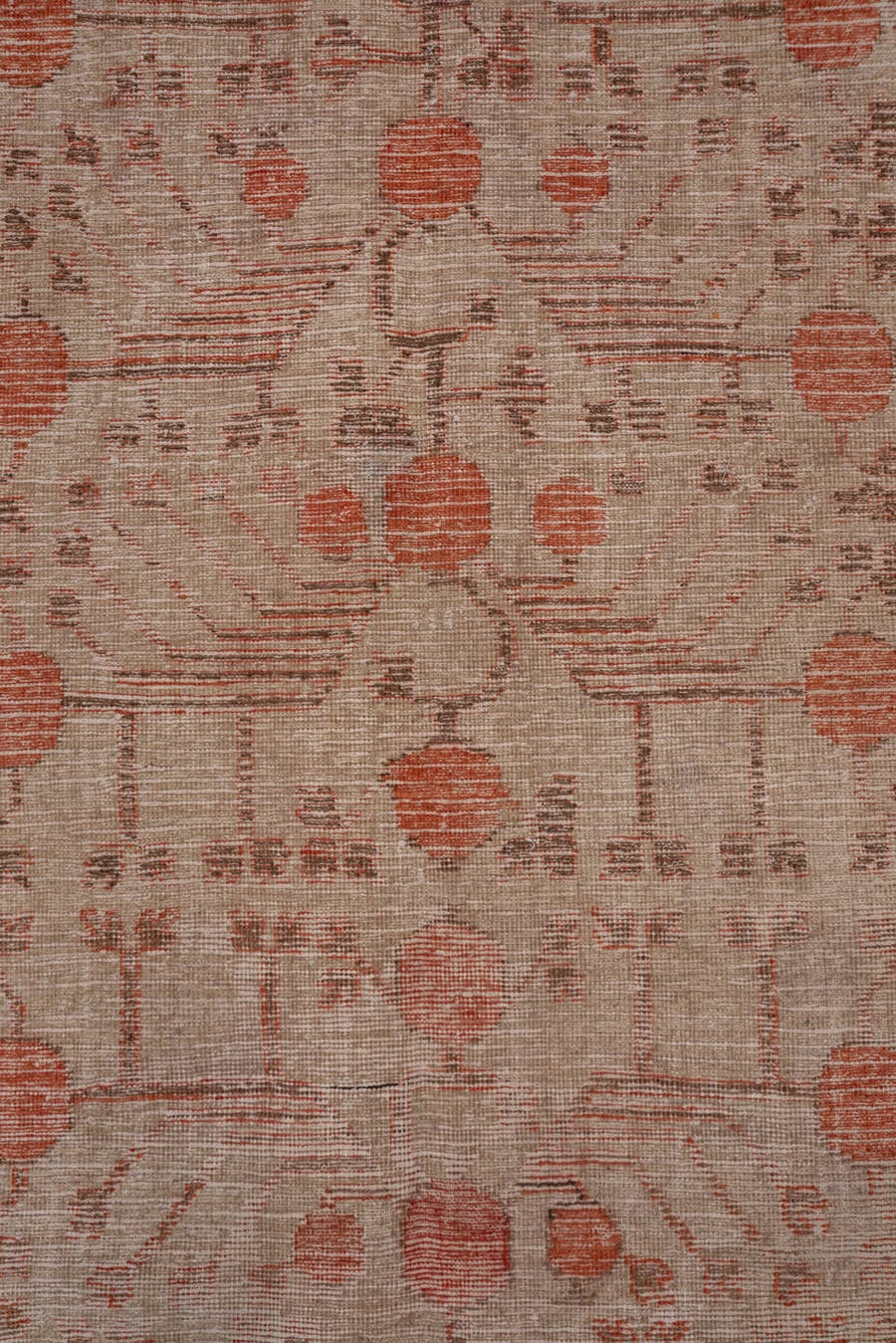 5' x 11' one-of-a-kind handmade antique Khotan rug. Color palette: ivory, terra cotta, taupe, charcoal, rose, camel