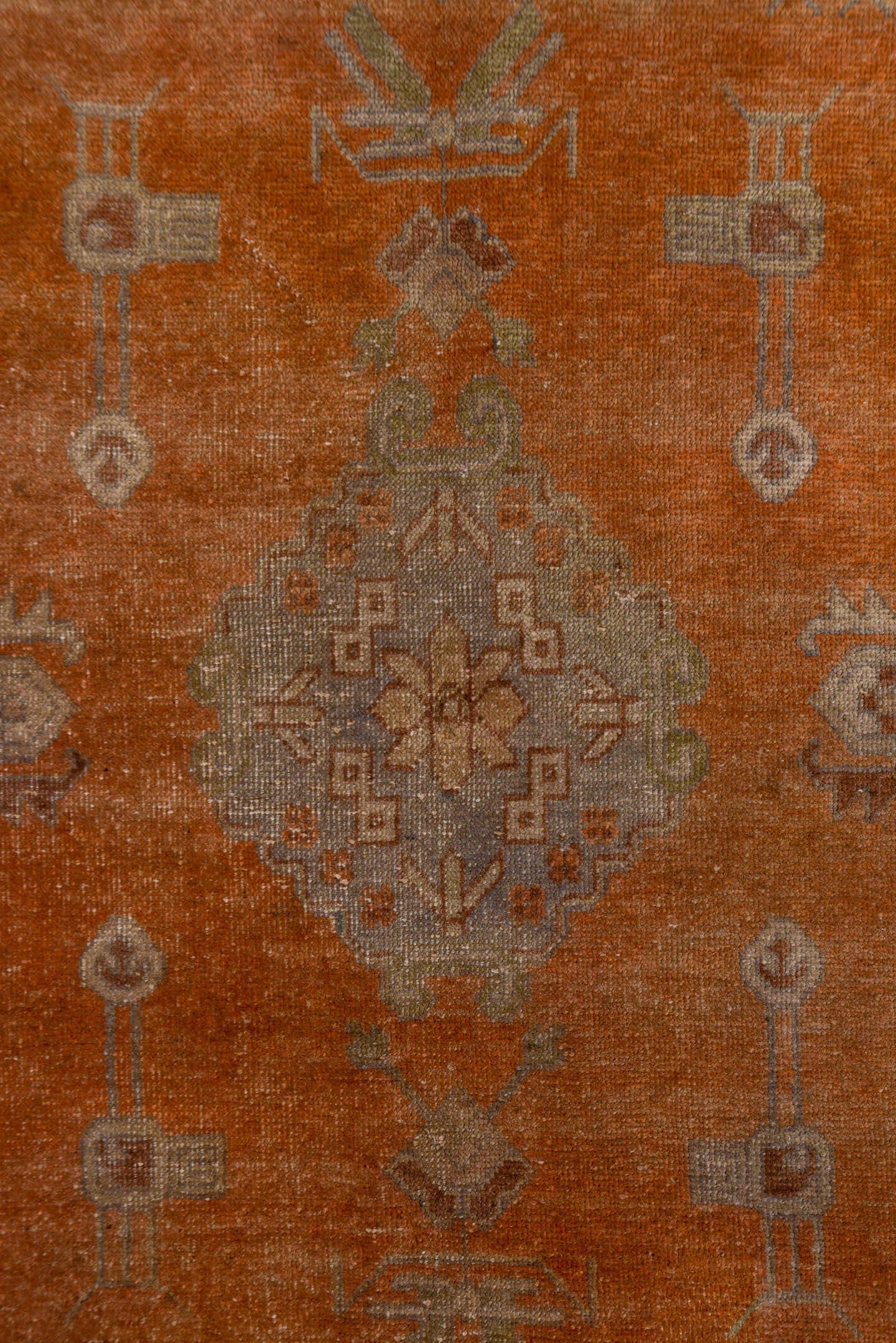 5' x 9' one-of-a-kind handmade antique Khotan medium size rug. Color palette: terra cotta, taupe, rust, camel, ivory, sienna