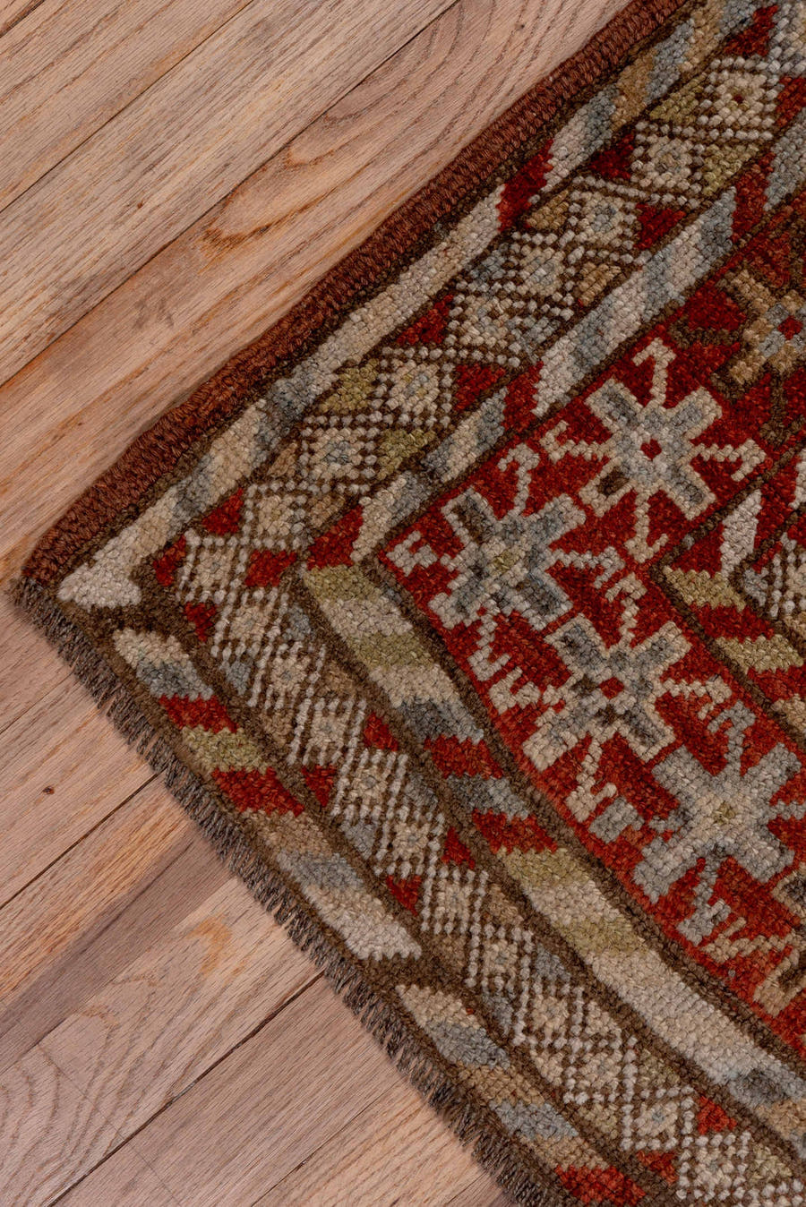 5' x 9' one-of-a-kind handmade antique NW Persian medium size rug. Color palette: taupe, rust, ivory, slate, brown, camel