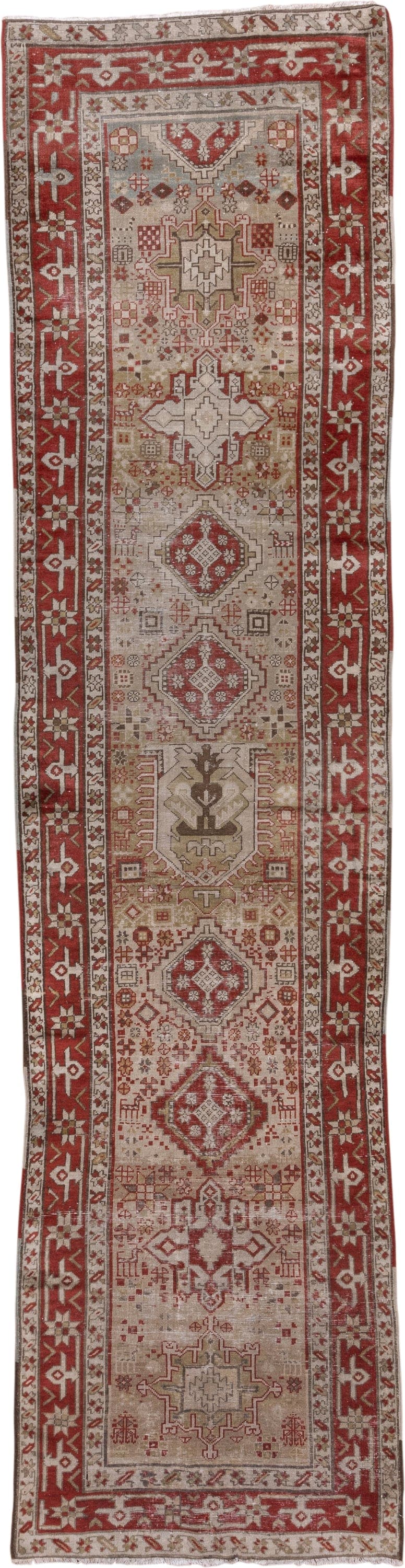 3' x 12' one-of-a-kind handmade antique Karaje runner rug. Color palette: ivory, rust, brick, taupe, camel, brown, rose