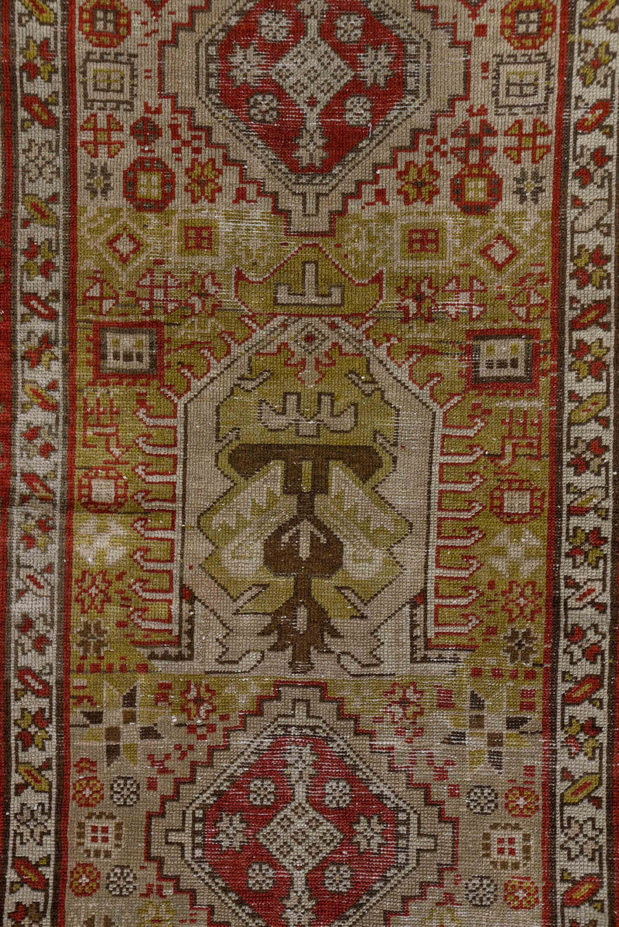 3' x 12' one-of-a-kind handmade antique Karaje runner rug. Color palette: ivory, rust, brick, taupe, camel, brown, rose