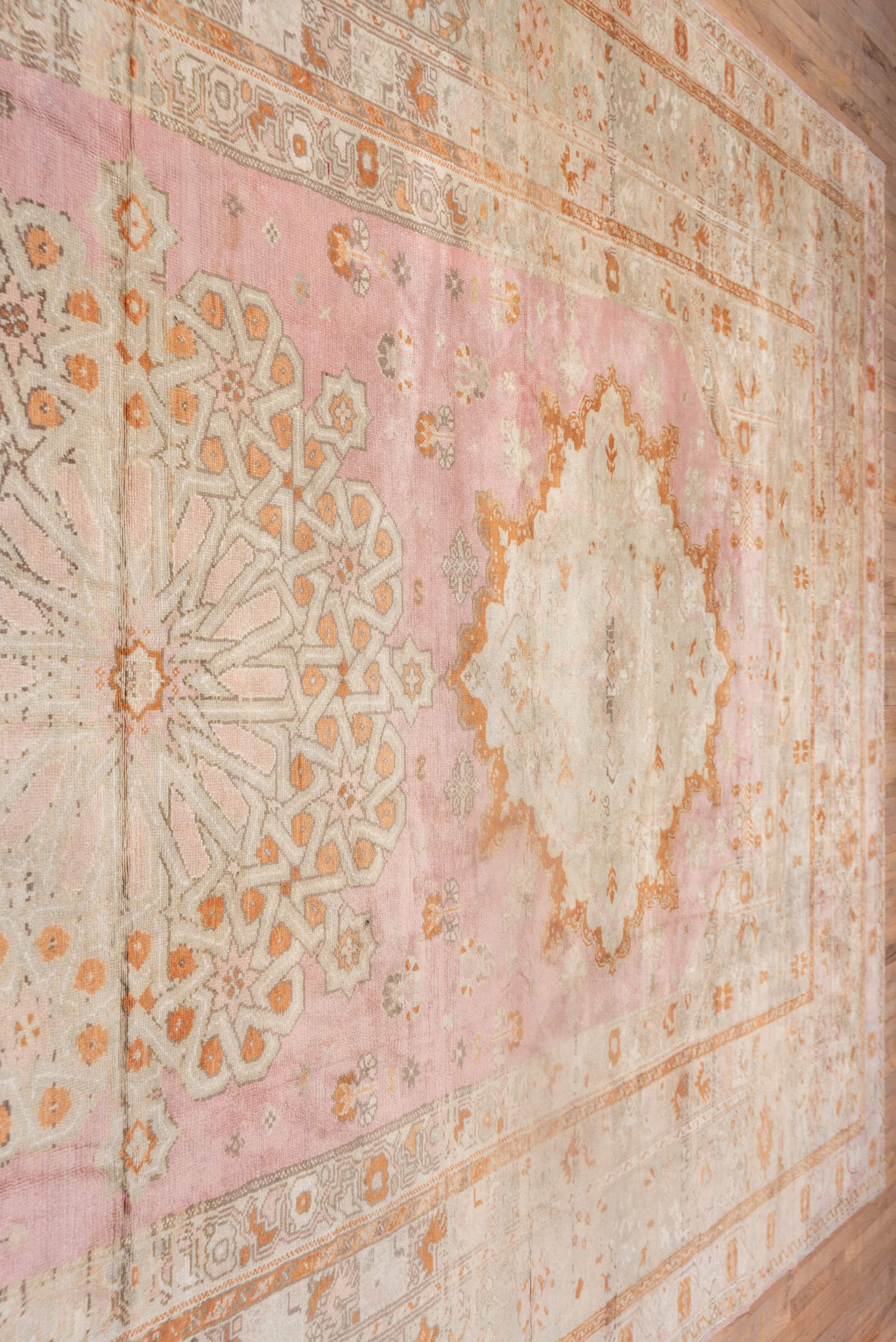 10' x 21' one-of-a-kind handmade antique Oushak rug. Color palette: ivory, blush, peach, taupe, camel, sage, pink