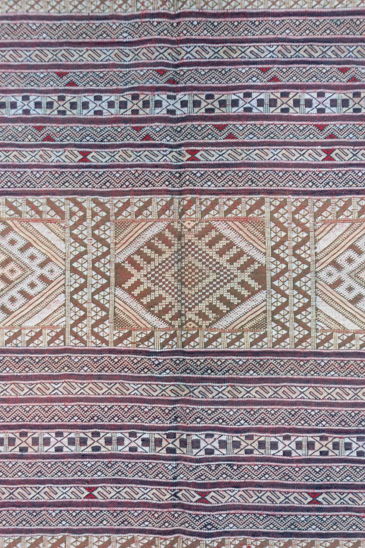 5' x 7' one-of-a-kind handmade vintage Jijim rug. Color palette: ivory, rose, burgundy, indigo, taupe, dusty blue, pink, red