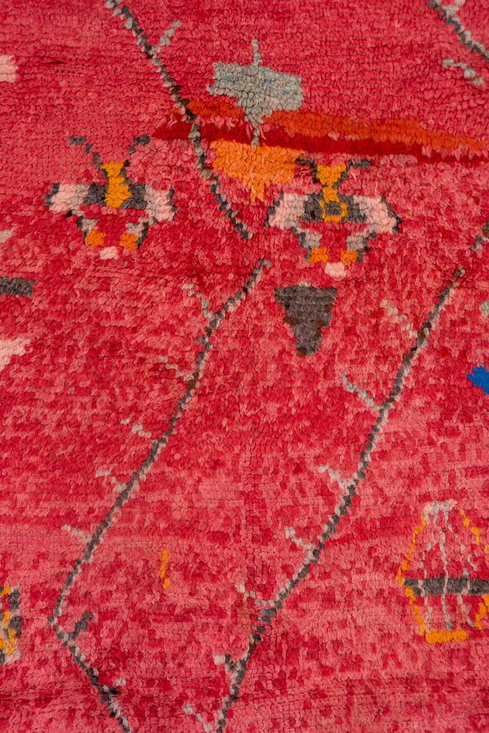 3' x 7' one-of-a-kind handmade vintage Moroccan rug. Color palette: rose, crimson, charcoal, coral, ivory, orange, cobalt
