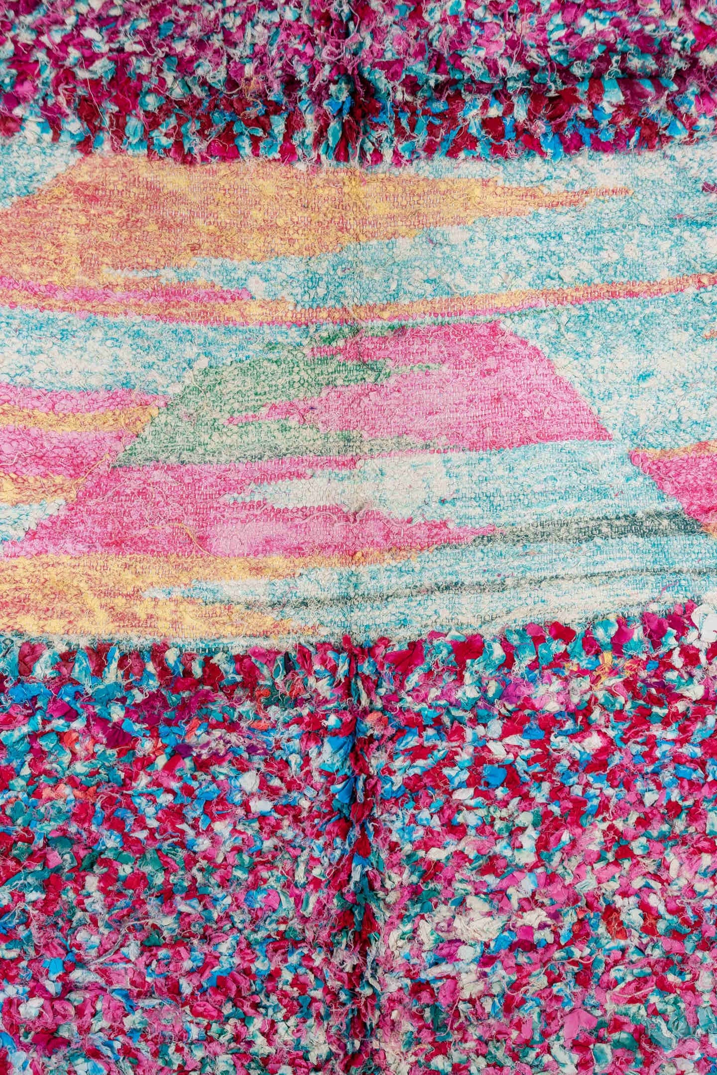 4' x 9' one-of-a-kind handmade vintage Rag Rug rug. Color palette: pink, turquoise, ivory, burgundy, rose, taupe, gold, teal