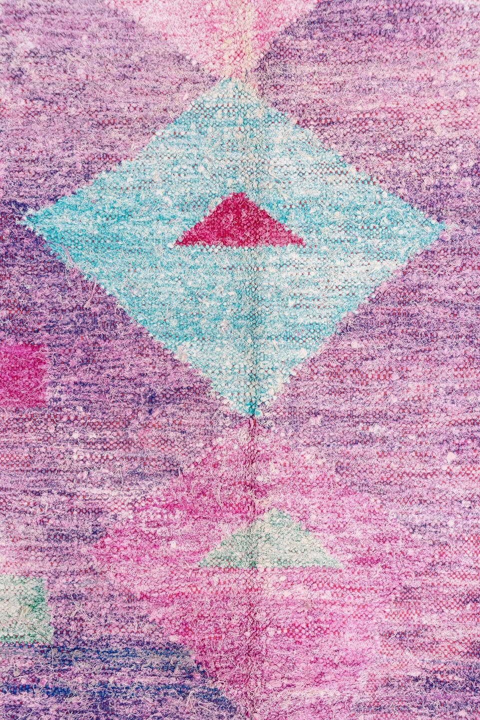 4' x 8' one-of-a-kind handmade vintage Rag Rug rug. Color palette: lavender, plum, pink, aqua, raspberry, mint, peach, ivory