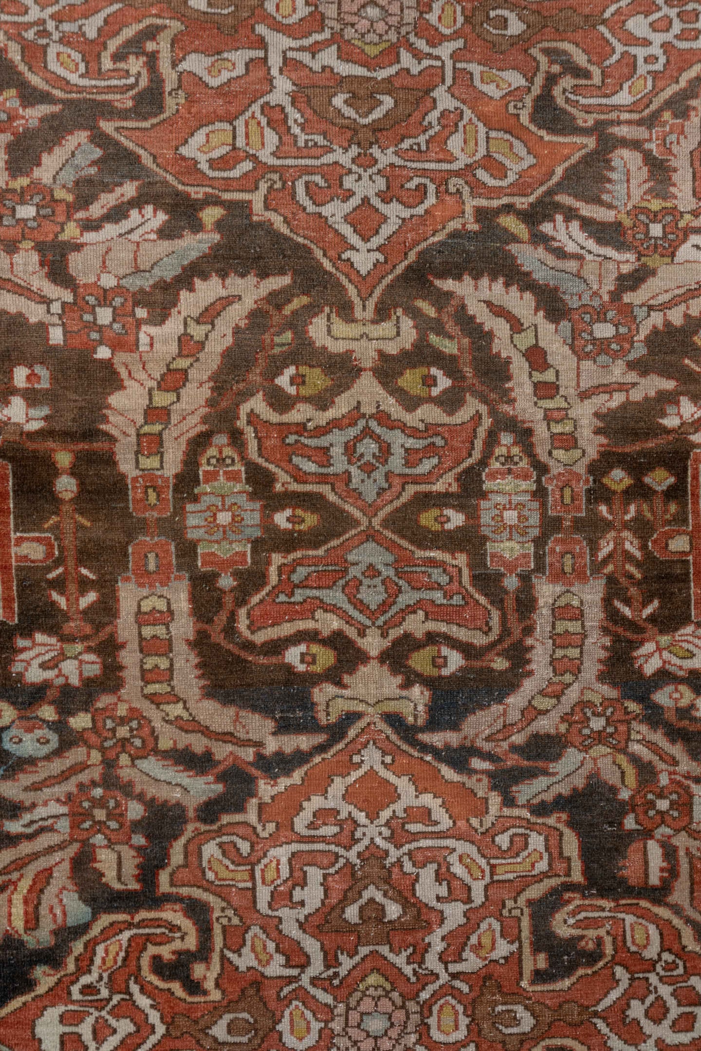 4' x 6' one-of-a-kind handmade antique Baktiary small size rug. Color palette: brown, rust, ivory, slate, camel, terra cotta