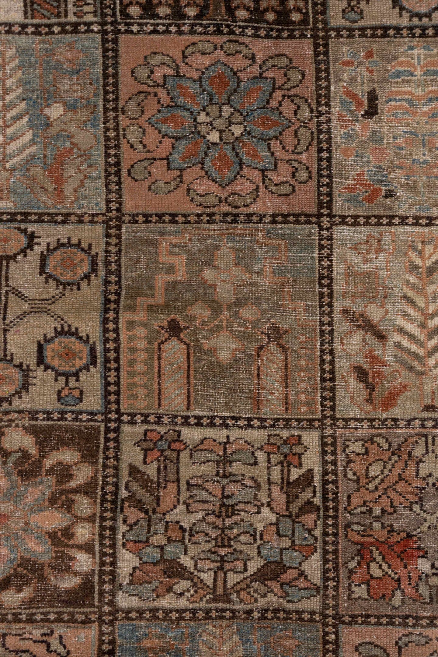 4' x 6' one-of-a-kind handmade antique Baktiary small size rug. Color palette: taupe, rose, brown, ivory, muted blue