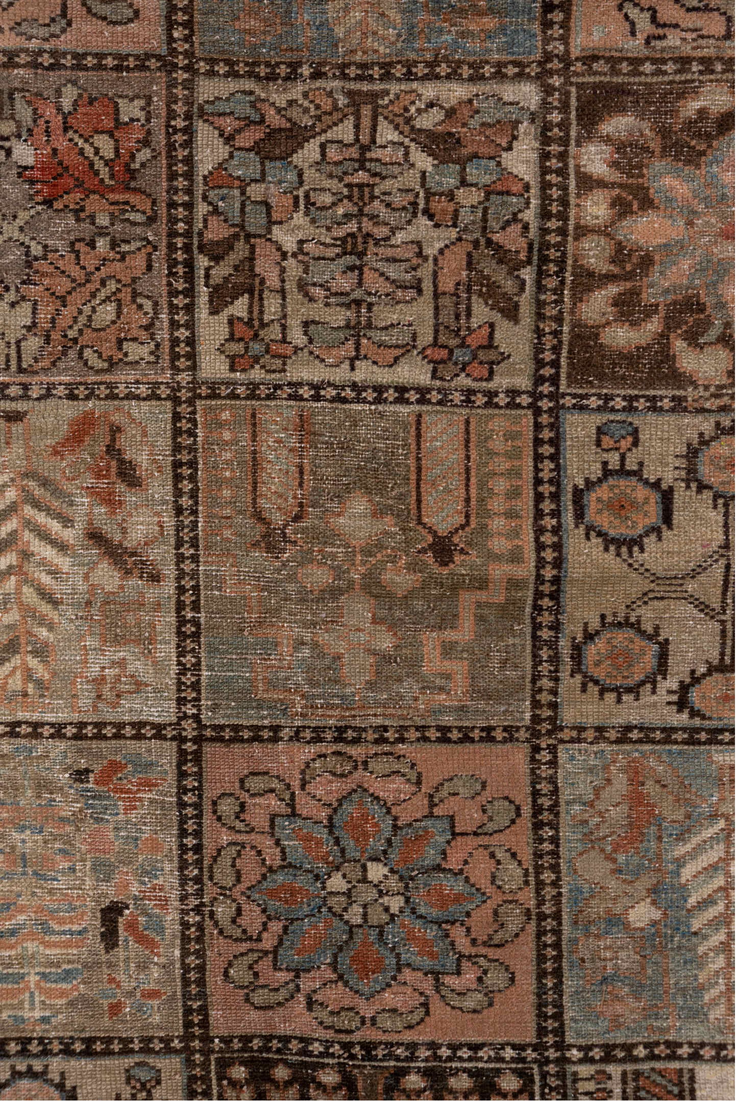4' x 6' one-of-a-kind handmade vintage Baktiary small size rug. Color palette: brown, gray, orange, pink