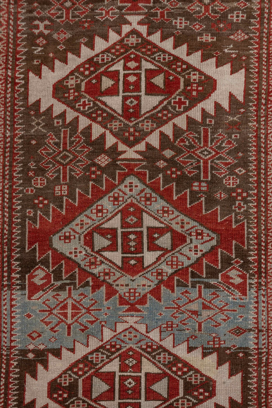 2' x 6' one-of-a-kind handmade antique Shirvan runner rug. Color palette: brown, rust, ivory, pale blue, taupe, brick, camel