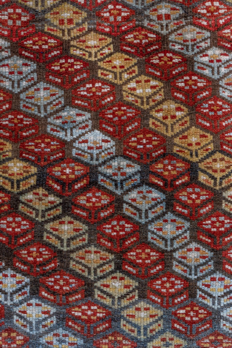 3' x 7' one-of-a-kind handmade antique Kurd rug. Color palette: rust, ivory, sky blue, camel, olive, brown, brick, slate