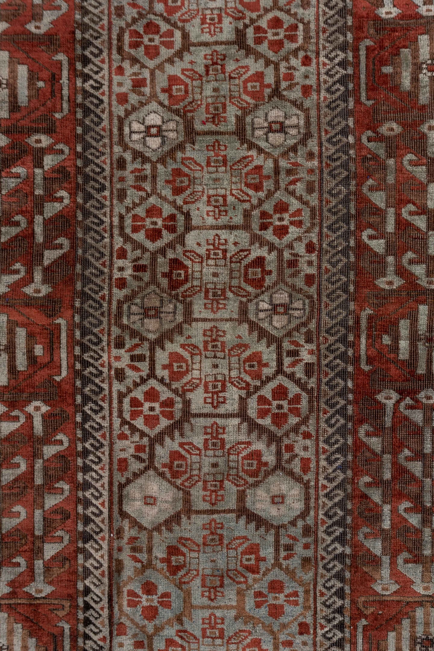 2' x 5' one-of-a-kind handmade antique Belouch small size rug. Color palette: rust, ivory, brown, camel, charcoal