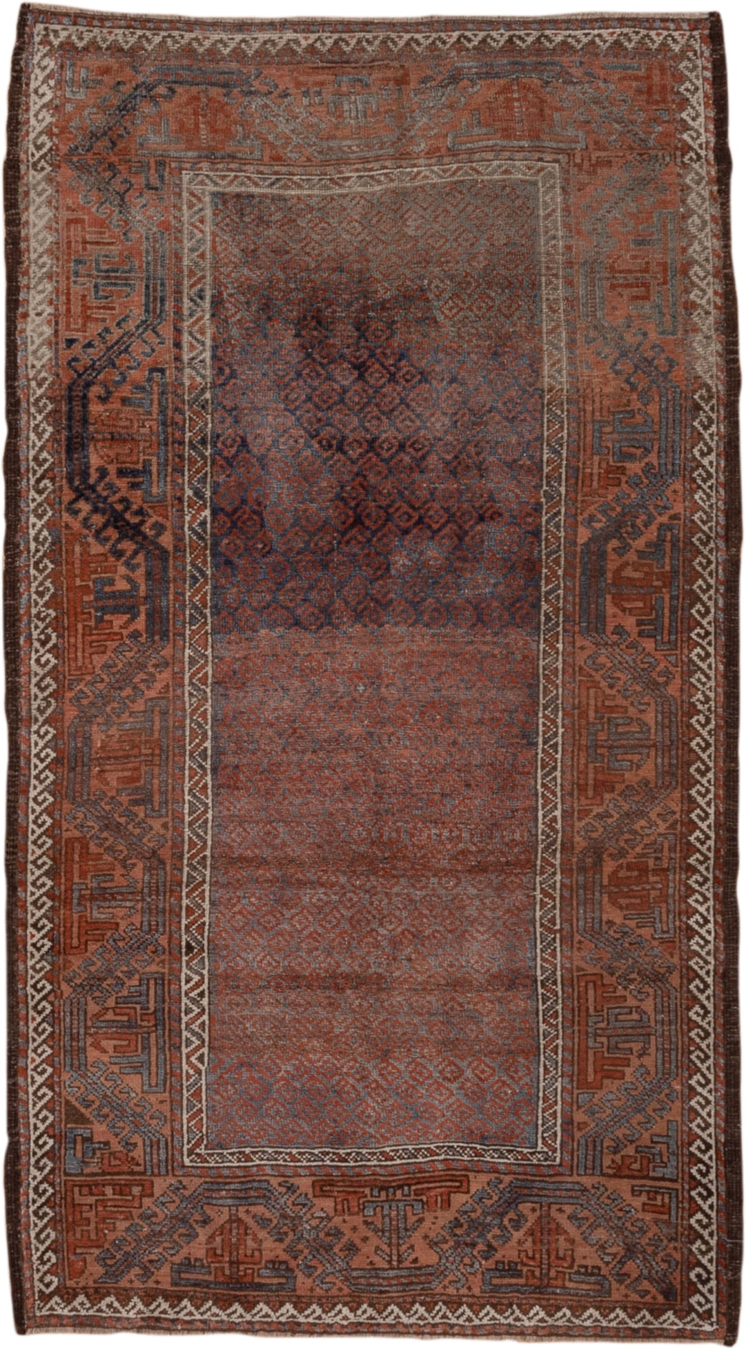 3' x 6' one-of-a-kind handmade antique Belouch small size rug. Color palette: rust, indigo, ivory, brown, charcoal