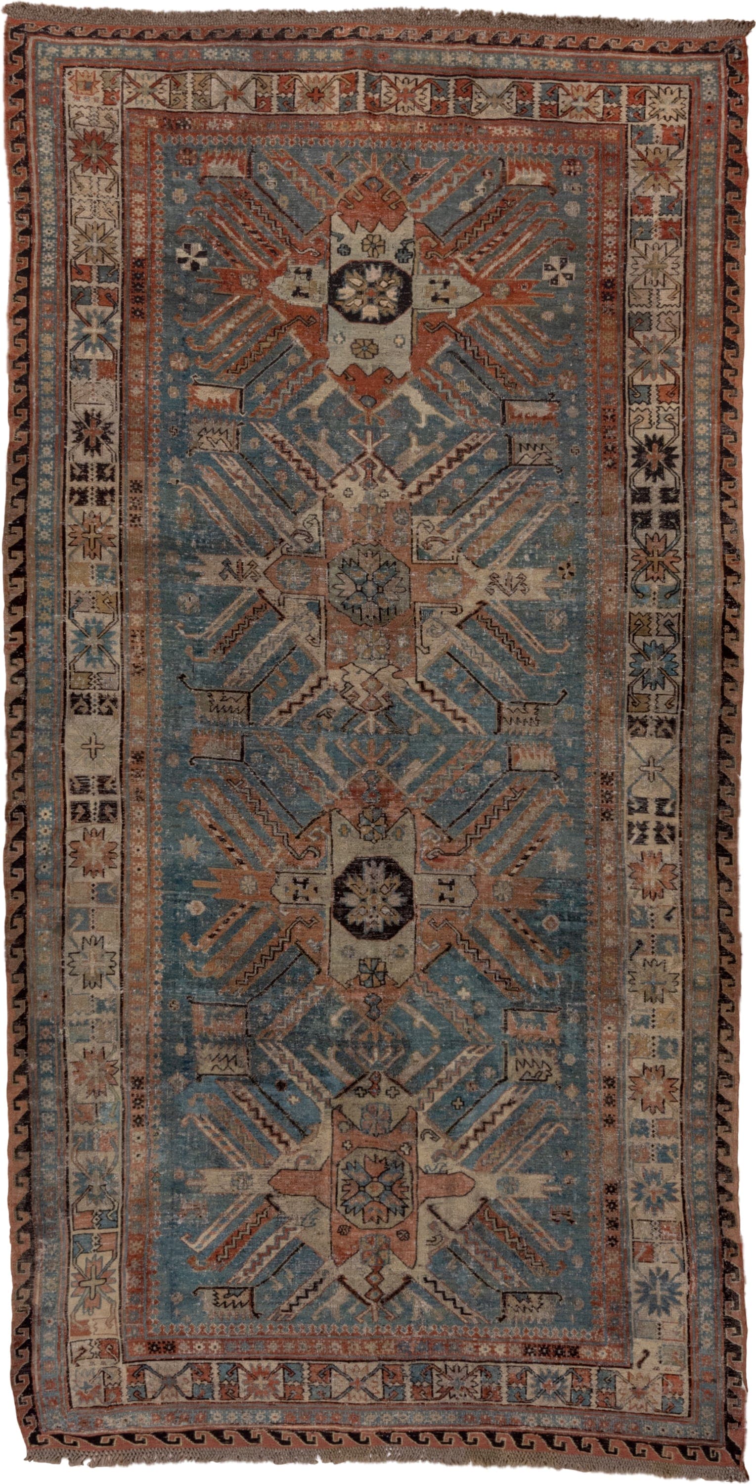 5' x 10' one-of-a-kind handmade antique Sumak medium size rug. Color palette: sky blue, ivory, rust, slate, camel, charcoal