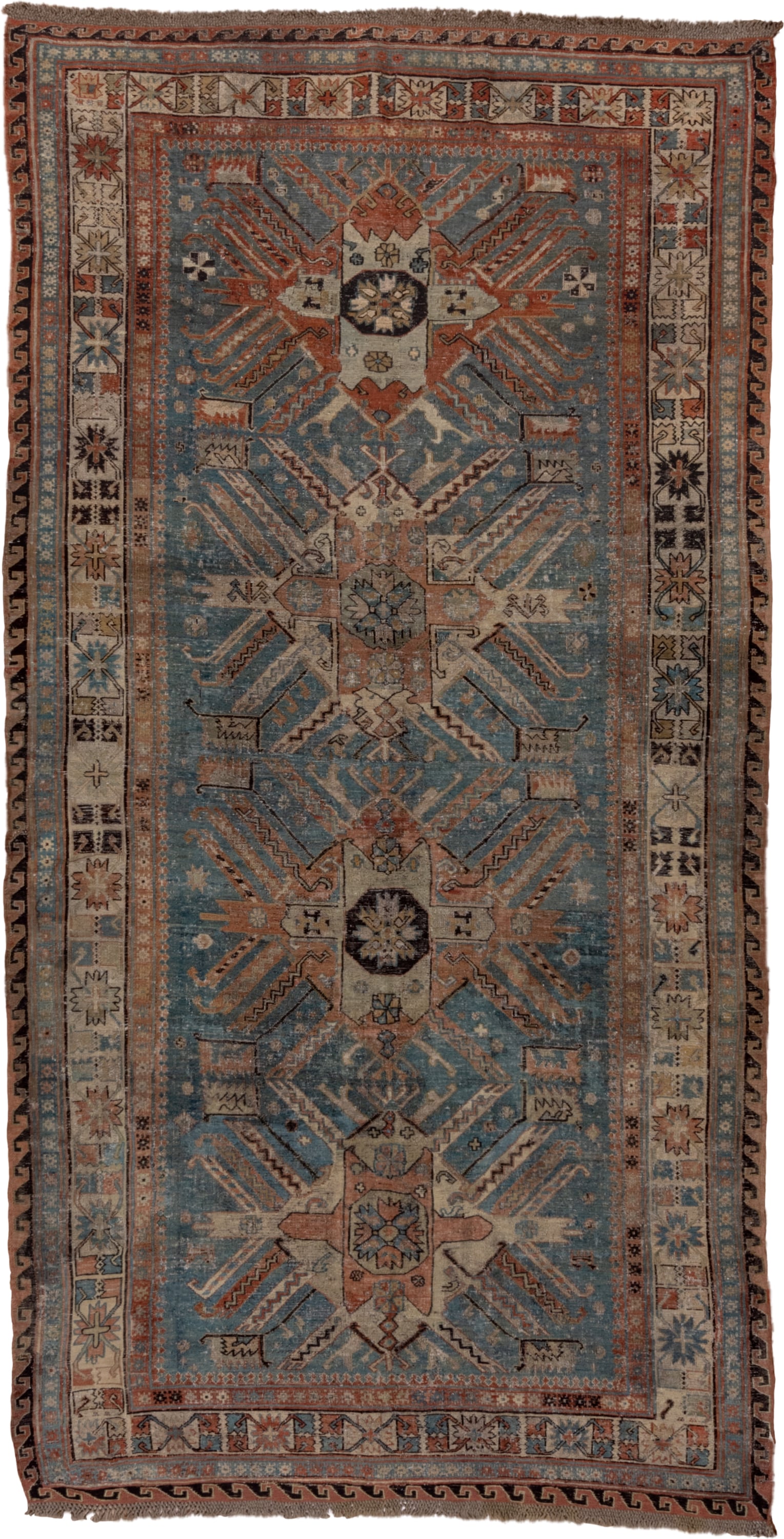 5' x 10' one-of-a-kind handmade antique Sumak medium size rug. Color palette: sky blue, ivory, rust, slate, camel, charcoal