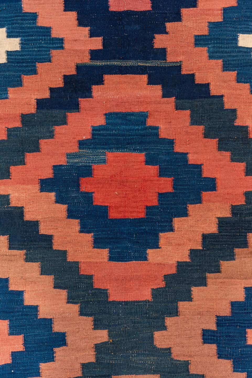 4' x 10' one-of-a-kind handmade vintage Kilim runner rug. Color palette: blue, brown, gray, off-white, orange, pink, red