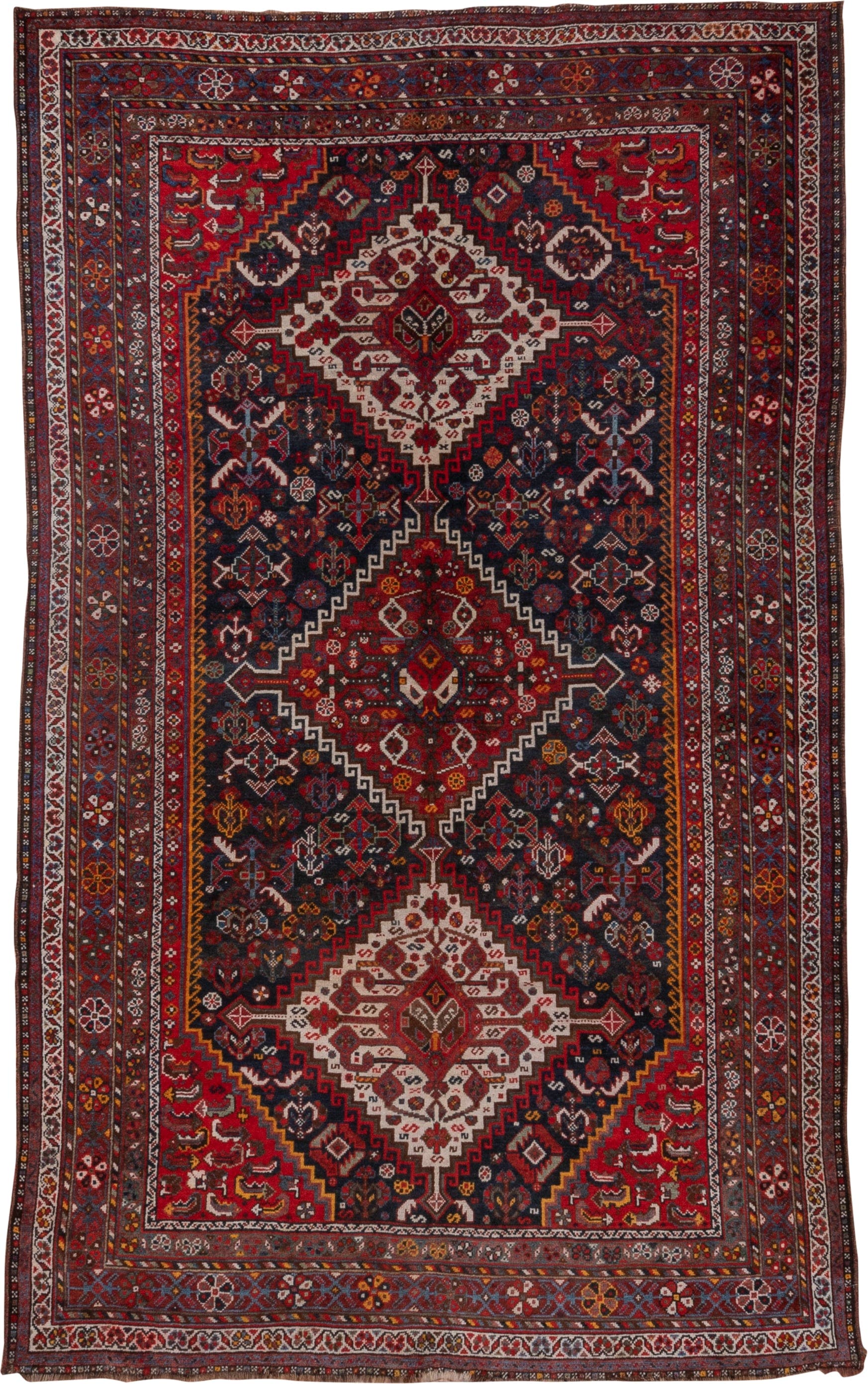 5' x 8' one-of-a-kind handmade antique Shiraz medium size rug. Color palette: red, navy, ivory, rust, burgundy, slate, gold