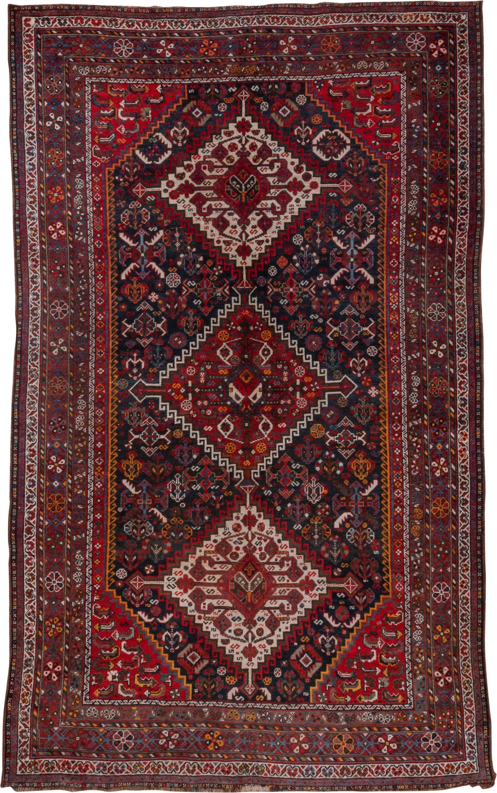 5' x 8' one-of-a-kind handmade antique Shiraz medium size rug. Color palette: red, navy, ivory, rust, burgundy, slate, gold