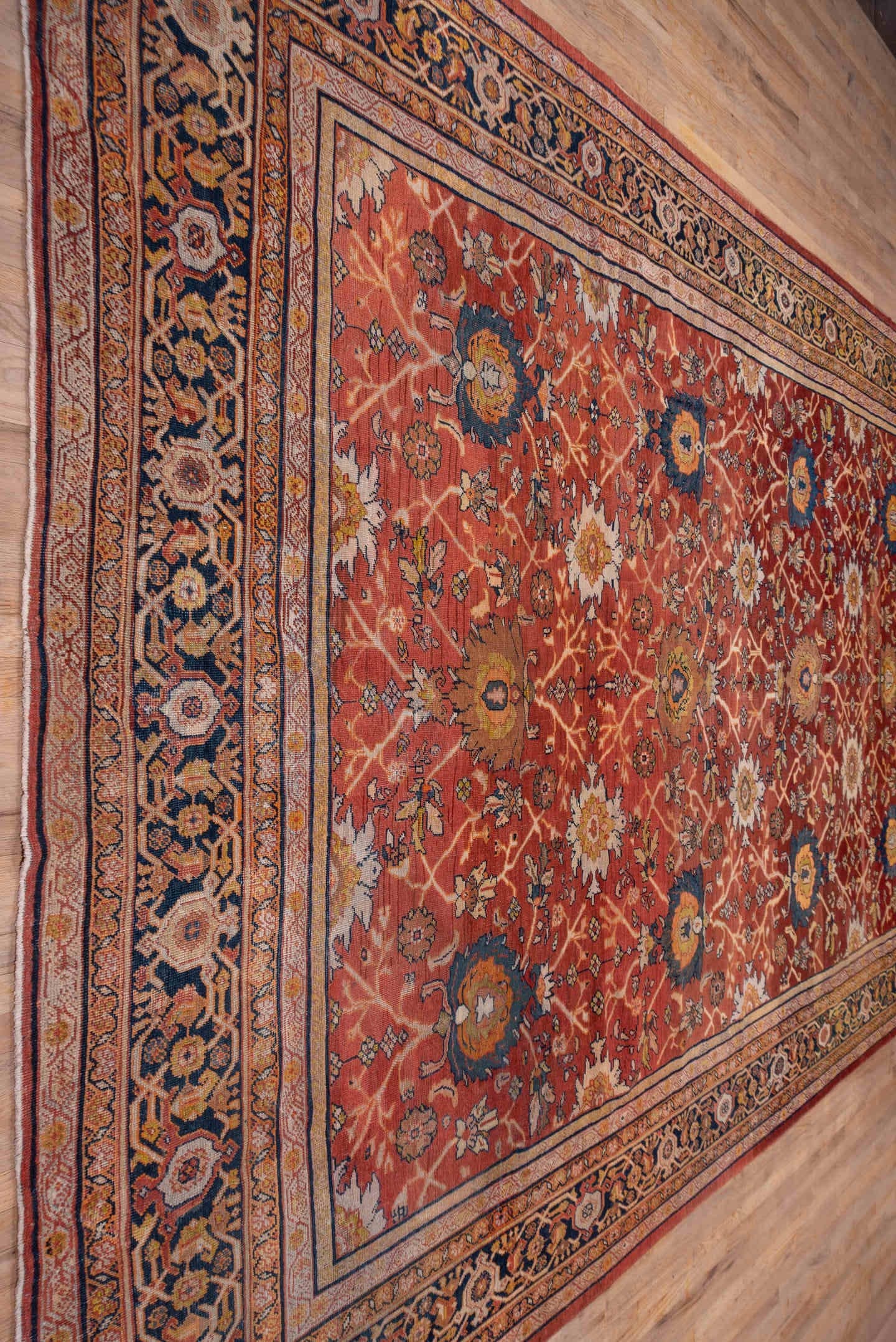 10' x 15' one-of-a-kind handmade antique Mahal rug. Color palette: terra cotta, navy, ivory, rust, gold, camel, sienna