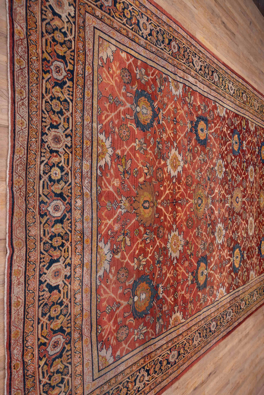 10' x 15' one-of-a-kind handmade antique Mahal rug. Color palette: terra cotta, navy, ivory, rust, gold, camel, sienna