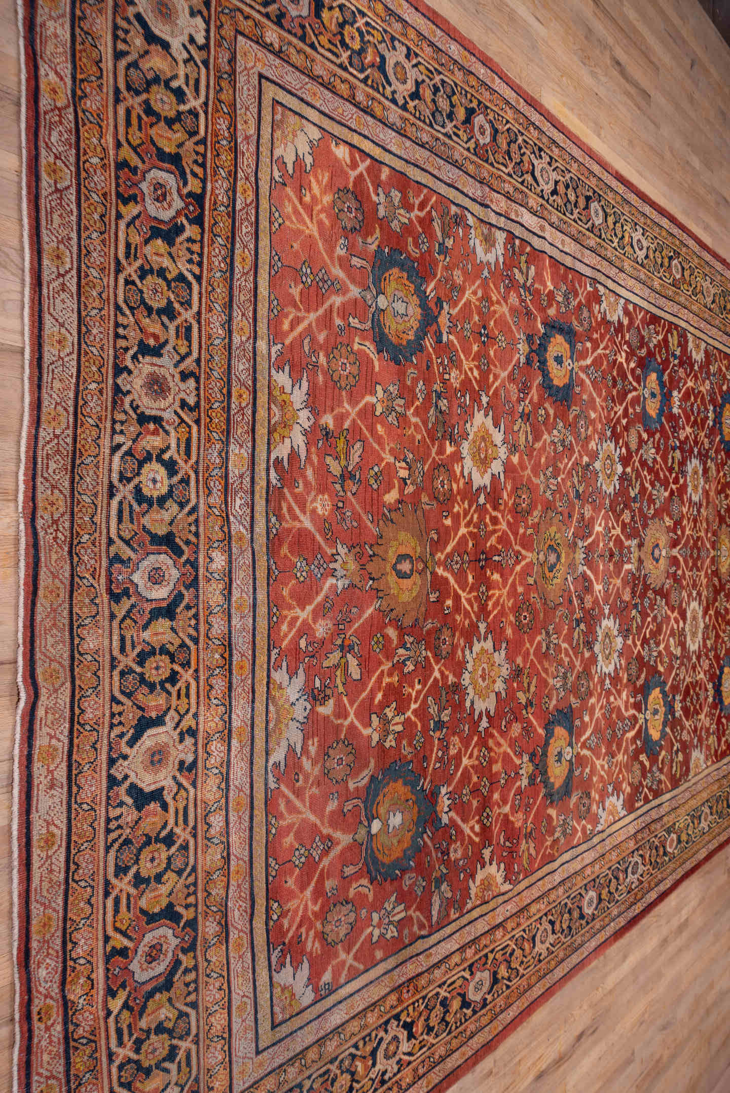 10' x 15' one-of-a-kind handmade antique Mahal rug. Color palette: terra cotta, navy, ivory, rust, gold, camel, sienna