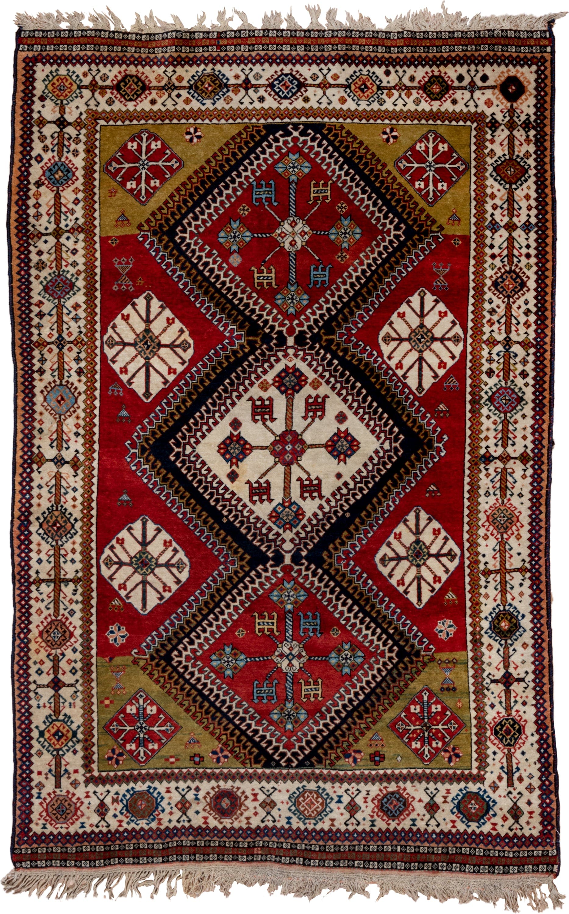 4' x 7' one-of-a-kind handmade vintage Qashqai rug. Color palette: crimson, ivory, indigo, camel, sky_blue, rust, black, red