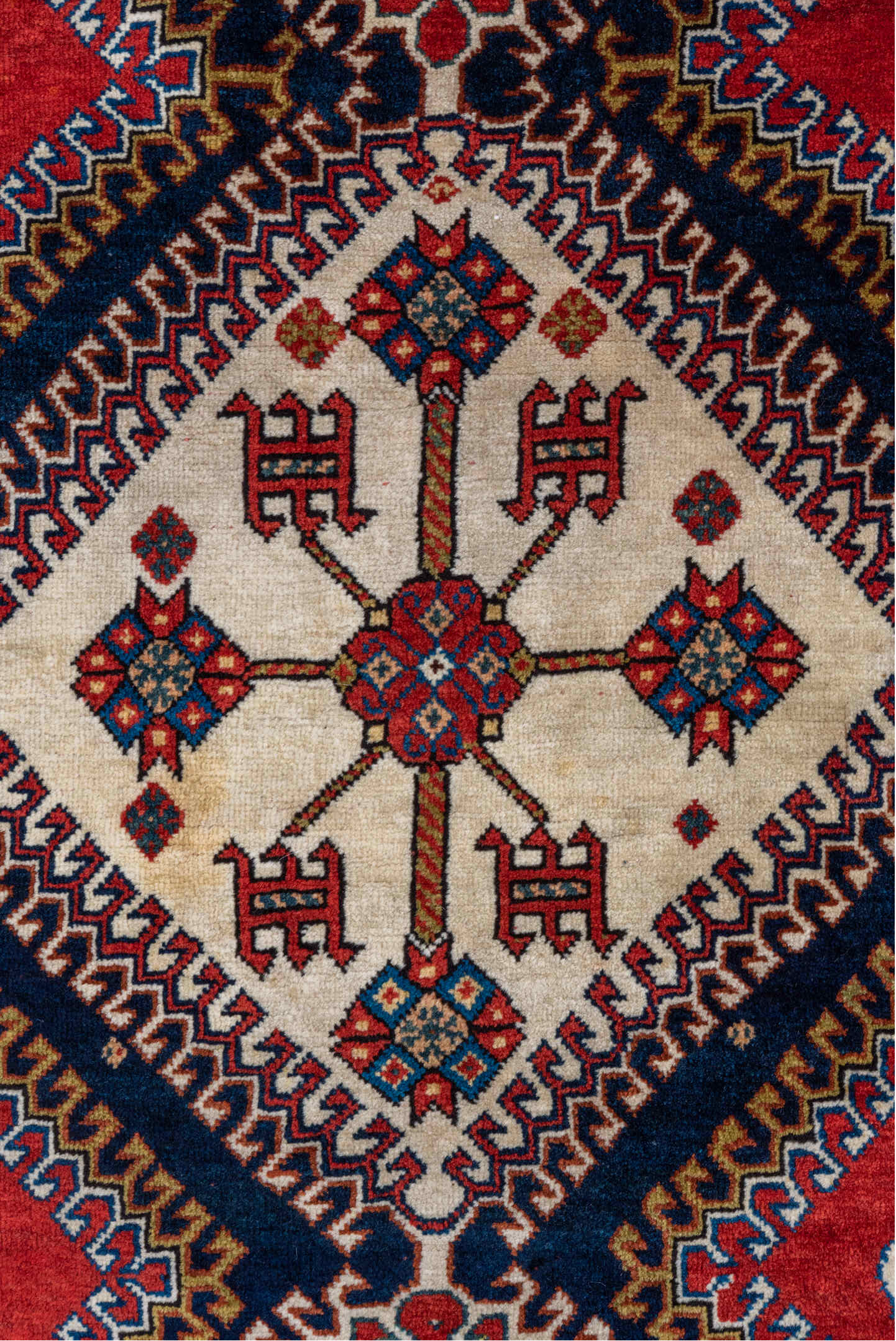 4' x 7' one-of-a-kind handmade vintage Qashqai rug. Color palette: crimson, ivory, indigo, camel, sky_blue, rust, black, red
