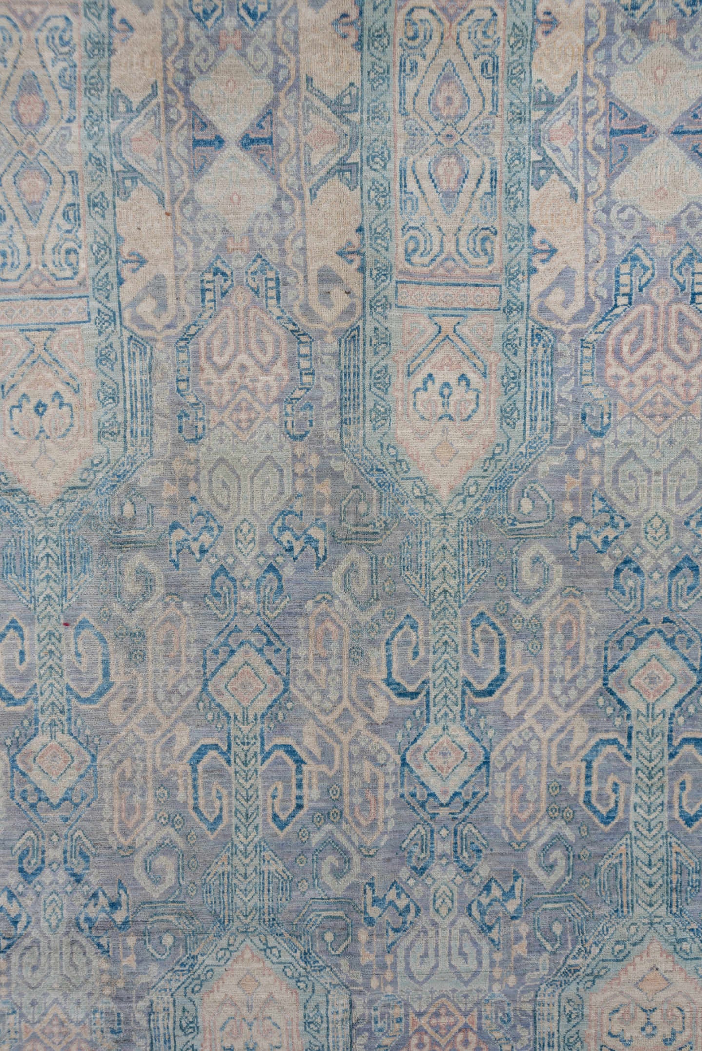 7' x 10' one-of-a-kind handmade vintage Afghan large size rug. Color palette: sky blue, ivory, pale blue, slate, taupe