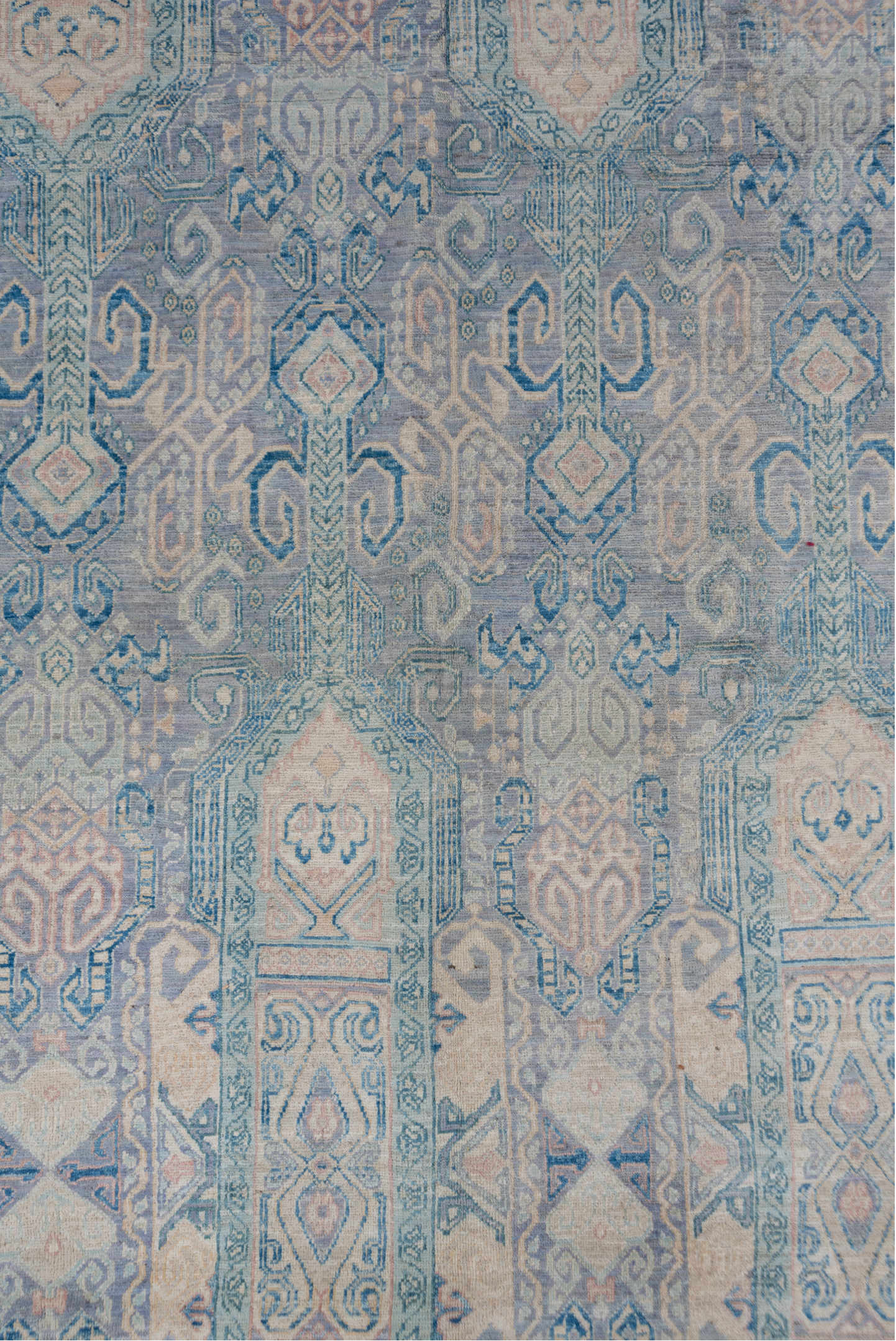 7' x 10' one-of-a-kind handmade vintage Afghan large size rug. Color palette: sky blue, ivory, pale blue, slate, taupe
