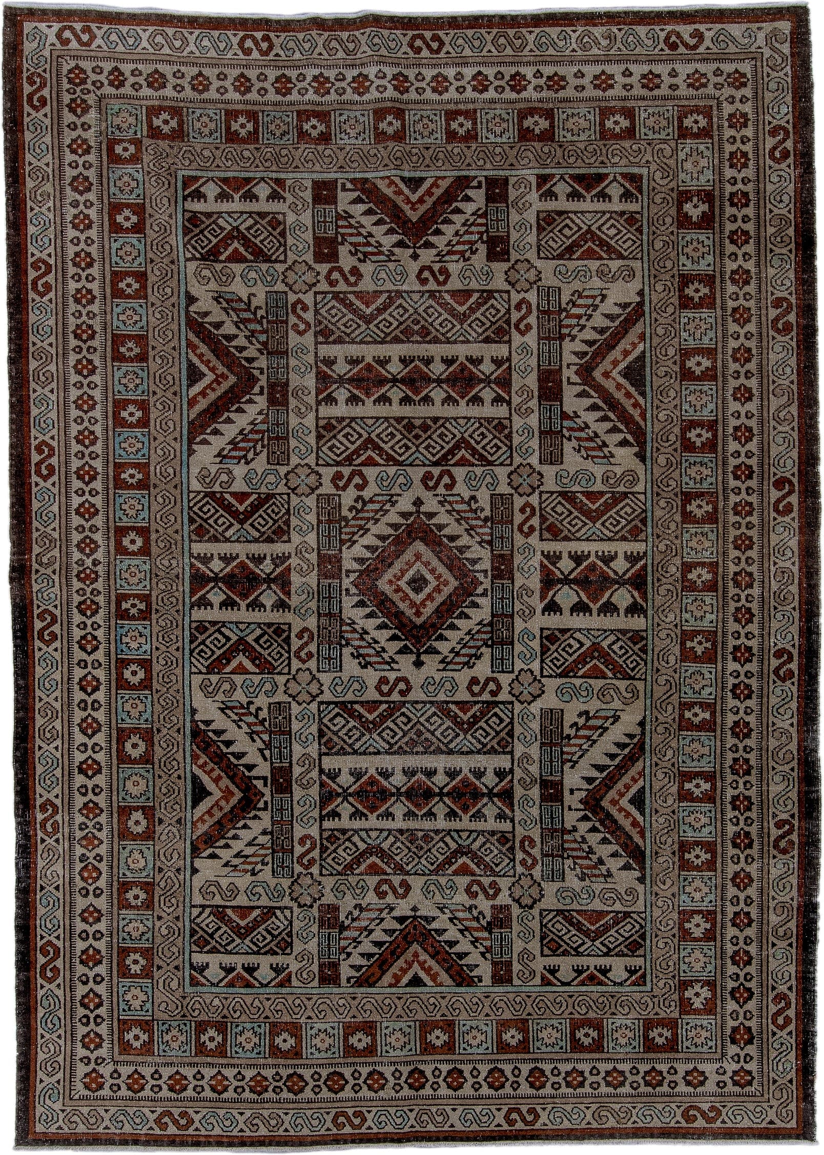 6' x 8' one-of-a-kind handmade antique Khotan medium size rug. Color palette: ivory, rust, brown, pale_blue, charcoal, taupe