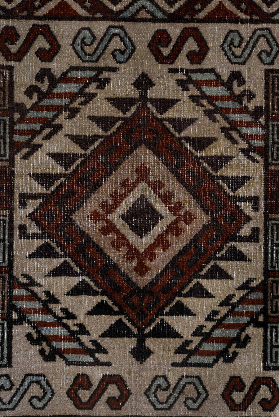 6' x 8' one-of-a-kind handmade antique Khotan medium size rug. Color palette: ivory, rust, brown, pale_blue, charcoal, taupe