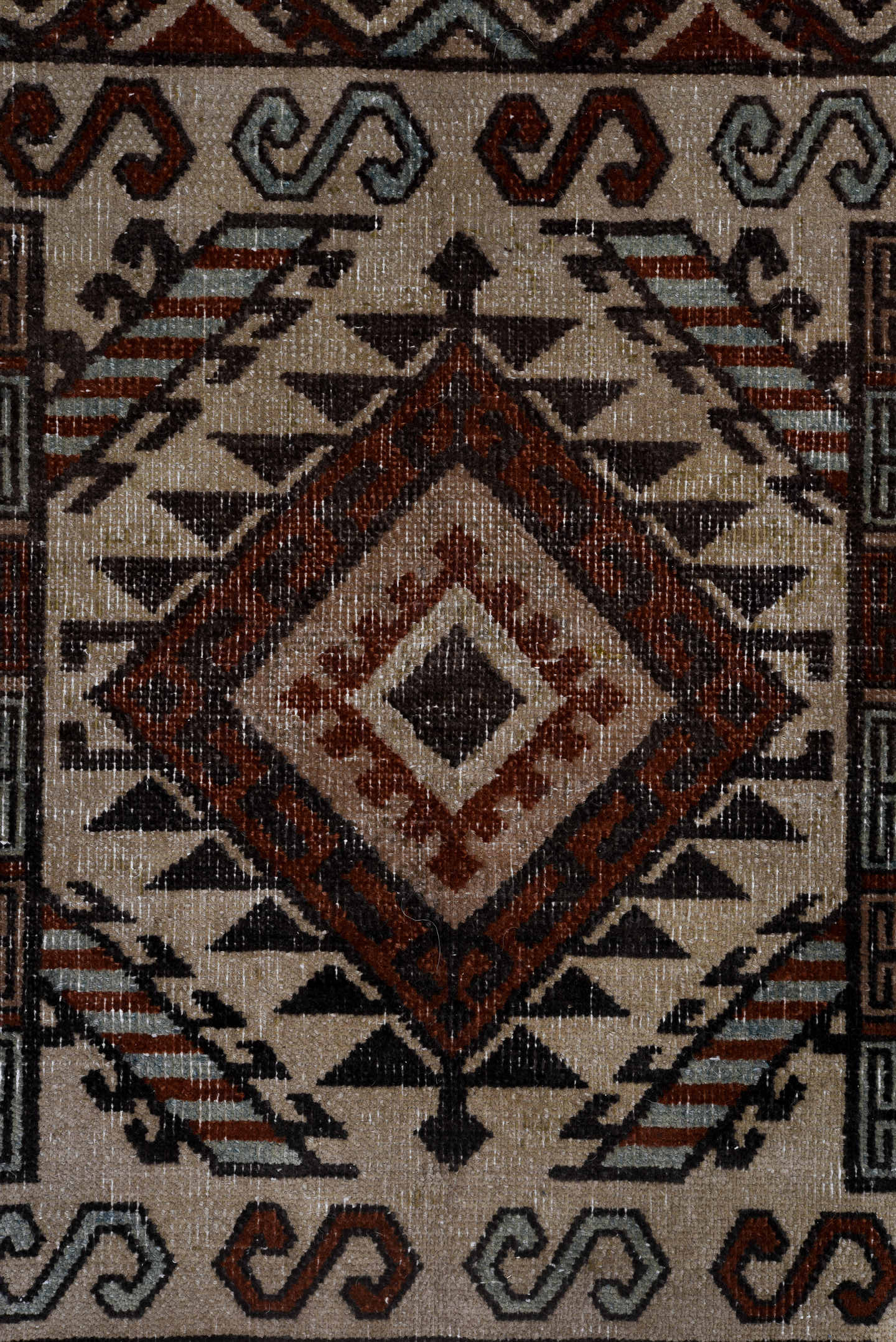 6' x 8' one-of-a-kind handmade antique Khotan medium size rug. Color palette: ivory, rust, brown, pale_blue, charcoal, taupe