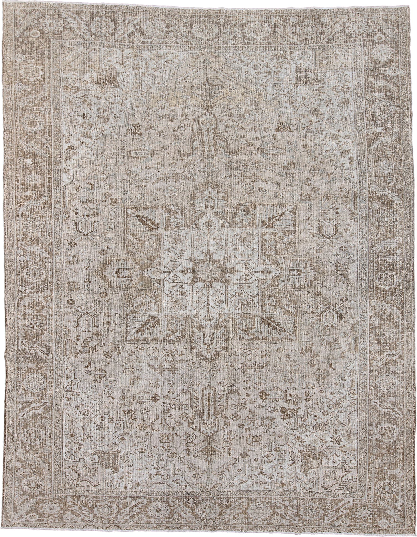 10' x 13' one-of-a-kind handmade antique Heriz large size rug. Color palette: ivory, taupe, beige, camel, sand, light brown