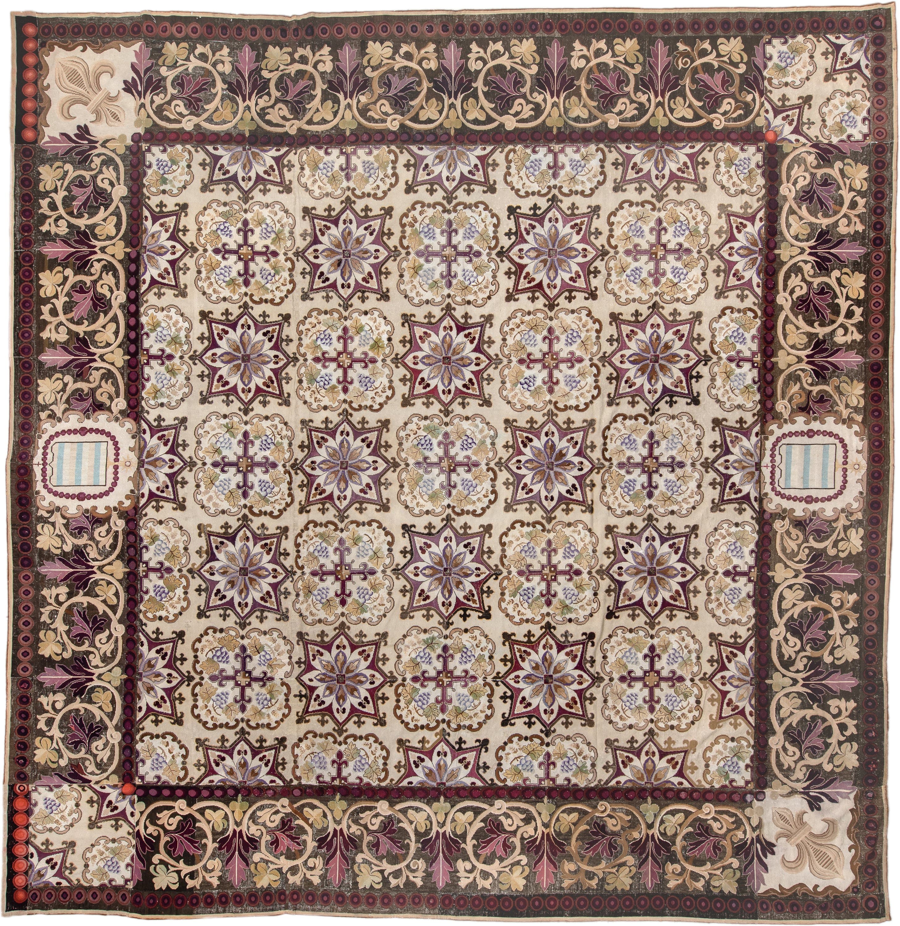 14' x 15' one-of-a-kind handmade antique Needlepoint oversize rug. Color palette: ivory, brown, burgundy, rose, taupe, sage
