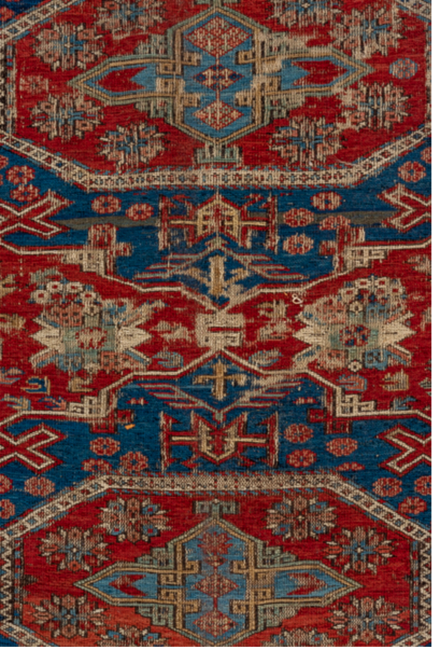 8' x 9' one-of-a-kind handmade antique Sumak rug. Color palette: rust, navy, ivory, sky blue, camel, crimson, terracotta