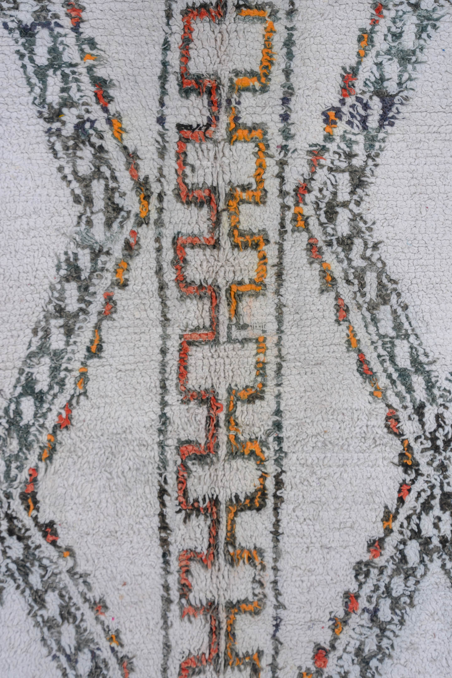 5' x 8' one-of-a-kind handmade vintage Moroccan medium size rug. Color palette: ivory, charcoal, rust, saffron, gray, black