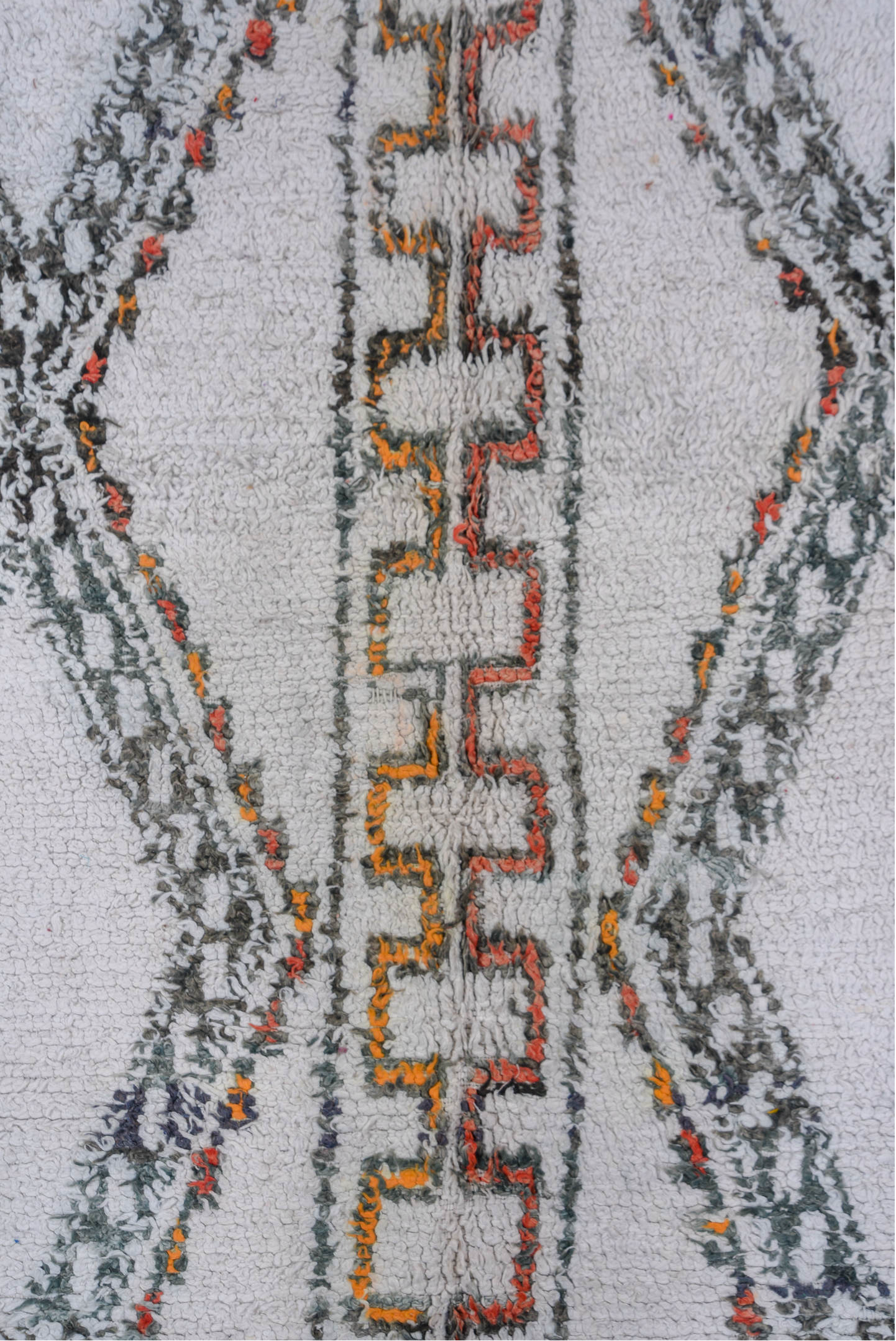 5' x 8' one-of-a-kind handmade vintage Moroccan medium size rug. Color palette: black, brown, charcoal, dark gray, dim gray