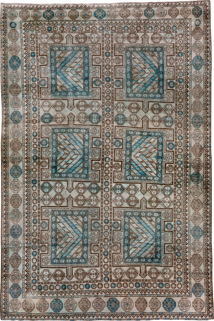 6' x 9' one-of-a-kind handmade vintage Turkish medium size rug. Color palette: black, blue, brown, gray, light gray