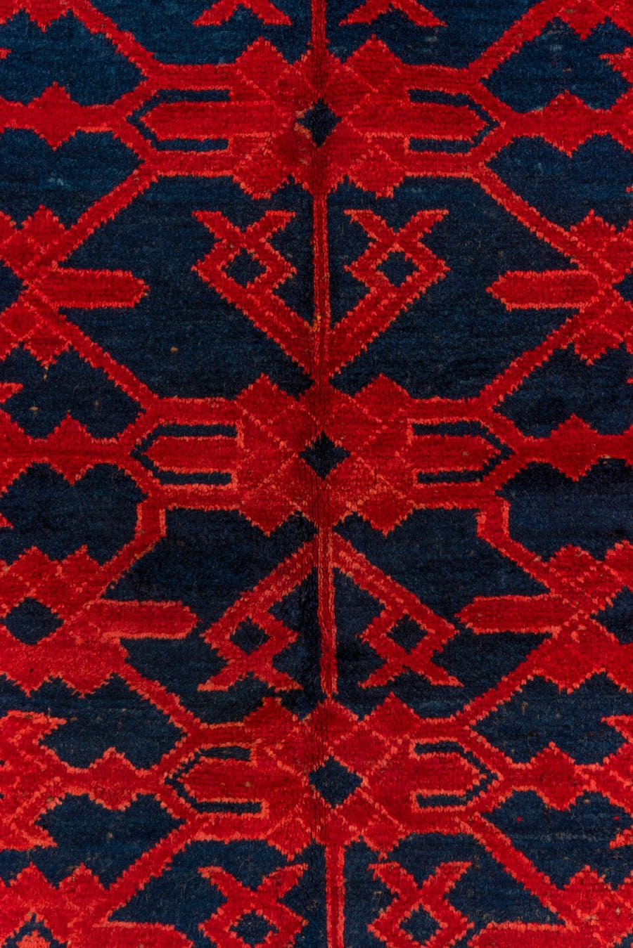 4' x 10' one-of-a-kind handmade antique Khotan runner rug. Color palette: crimson, navy, burgundy, indigo, red, blue, purple