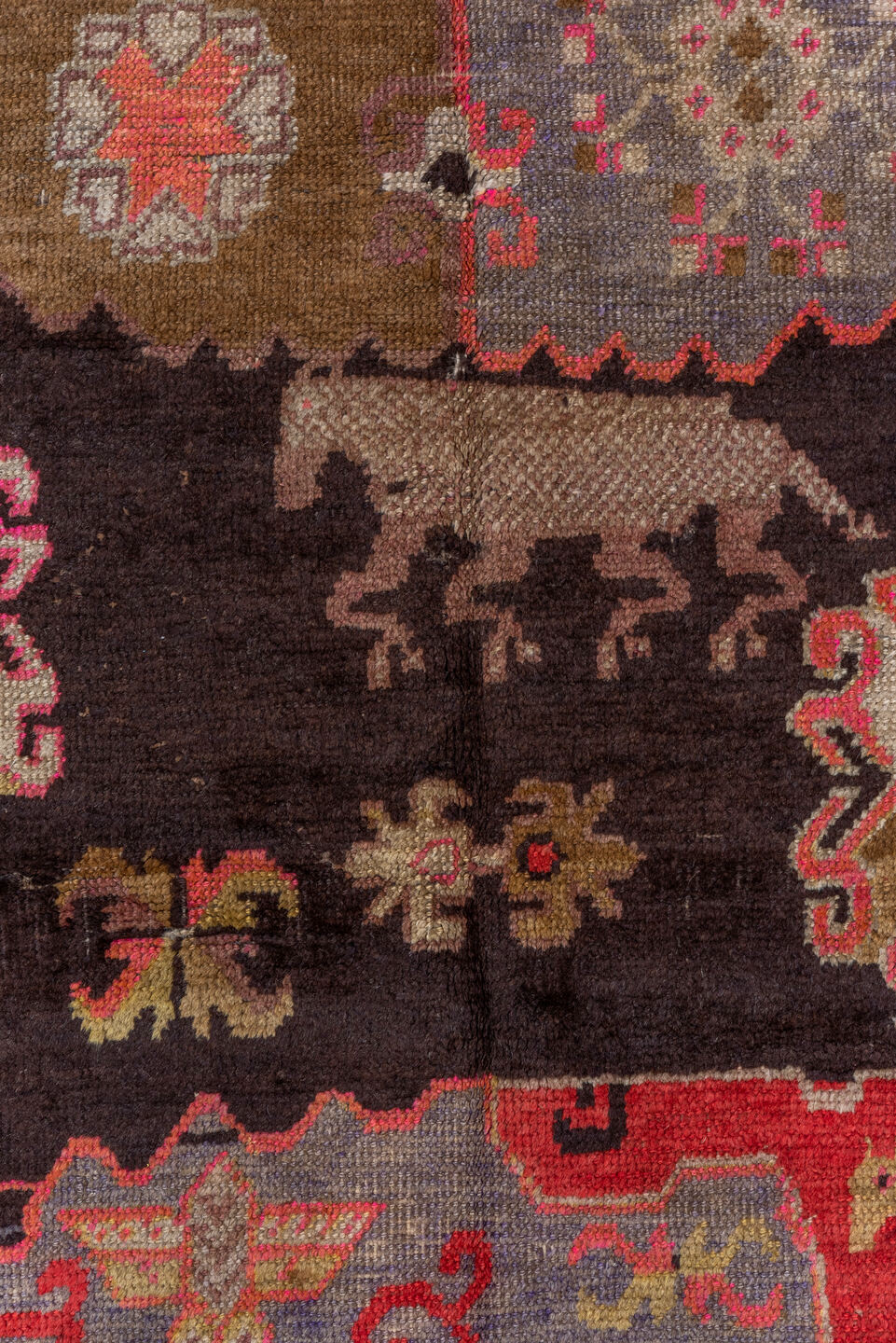 5' x 8' one-of-a-kind handmade vintage Khotan medium size rug. Color palette: black, brown, gray, pink, red