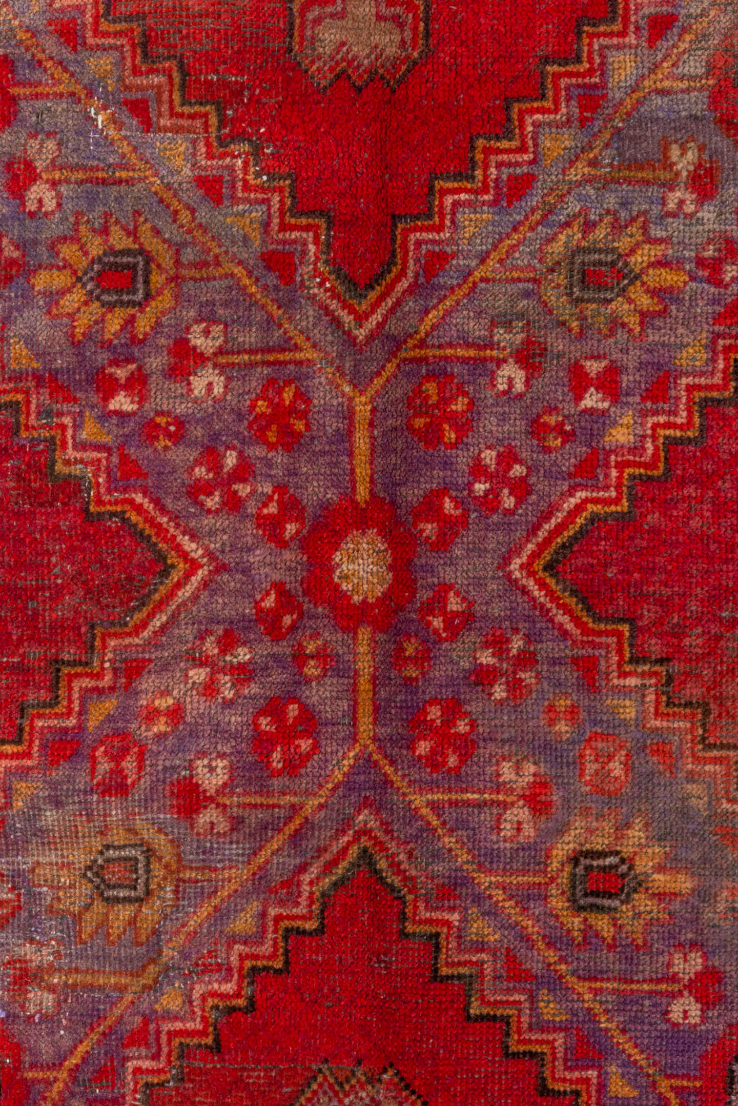 5' x 12' one-of-a-kind handmade antique Khotan rug. Color palette: red, crimson, rose, lavender, ivory, taupe, charcoal