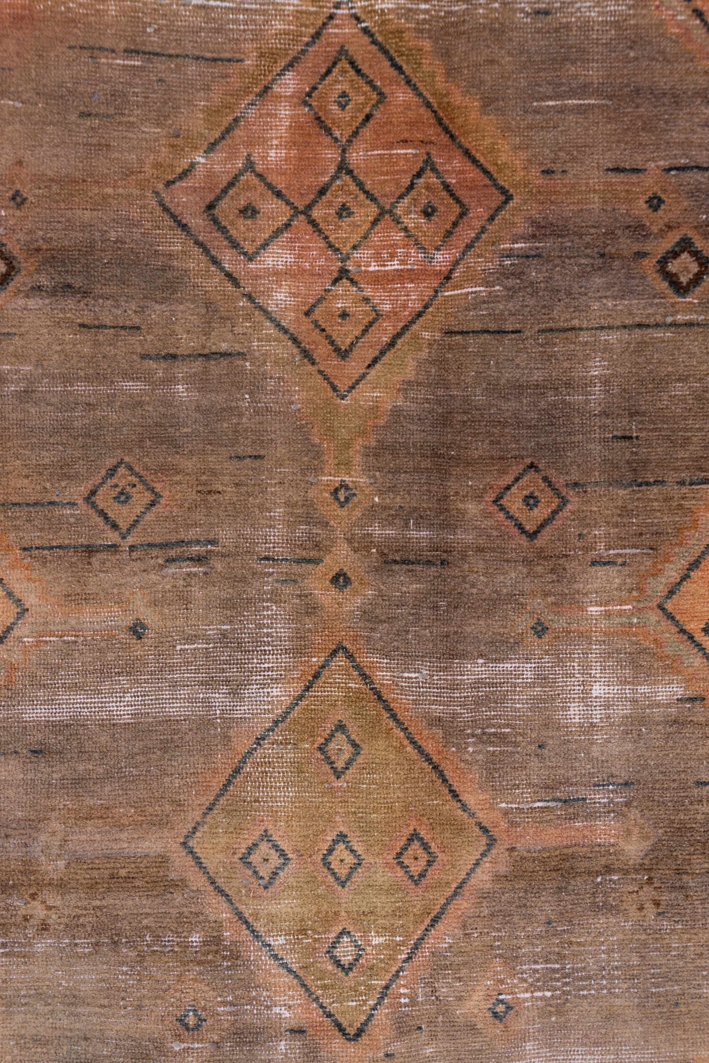 4' x 9' one-of-a-kind handmade vintage Distressed runner rug. Color palette: taupe, terra cotta, brown, charcoal, camel
