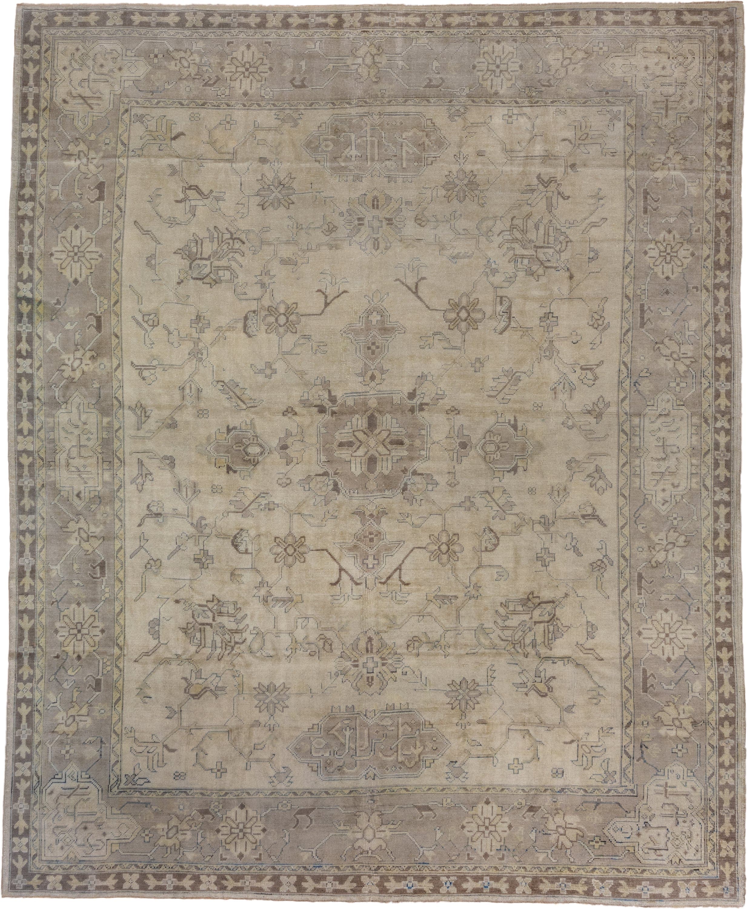 9' x 12' one-of-a-kind handmade antique Oushak large size rug. Color palette: ivory, taupe, beige, brown, pale blue, camel